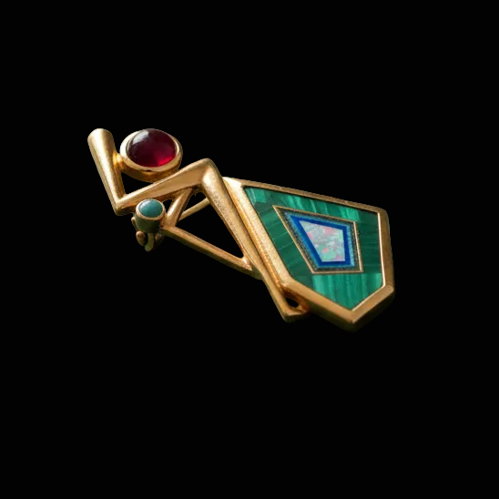 Estate Pendant,1 Garnet Cabochon, 1 Moonstone Cabochon, 1 Malachite Kite Cut, 1 Opal Kite Cut, 1 Onyx 14K Yellow Gold 5.09g. All weights estimated.