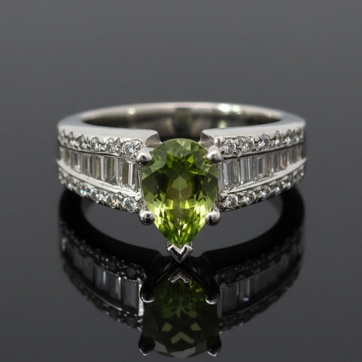 Unknown Ring, 1 PEAR PERIDOT 1.47Cttw  Diamond Bag/RBC 0.80Cttw  H/I VS1-SI1 PLAT 10.38G