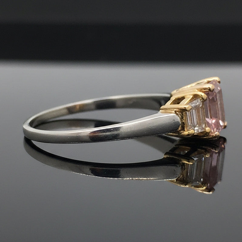 Estate Ring, 1 Oval Diamond 0.61 ct  Fancy Purple-Pink I1 GIA #14336063, 2 Trapezoid Cut Diamond 0.52 cttw  FY VVS1-VVS2 Platinum/18K Yellow/Rose Gold 3.43g. All Weights Estimated.