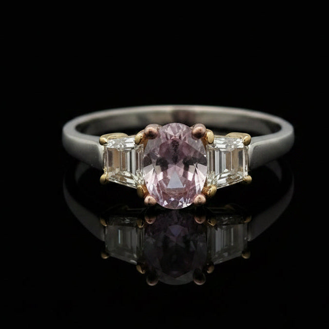 Estate Ring, 1 Oval Diamond 0.61 ct  Fancy Purple-Pink I1 GIA #14336063, 2 Trapezoid Cut Diamond 0.52 cttw  FY VVS1-VVS2 Platinum/18K Yellow/Rose Gold 3.43g. All Weights Estimated.