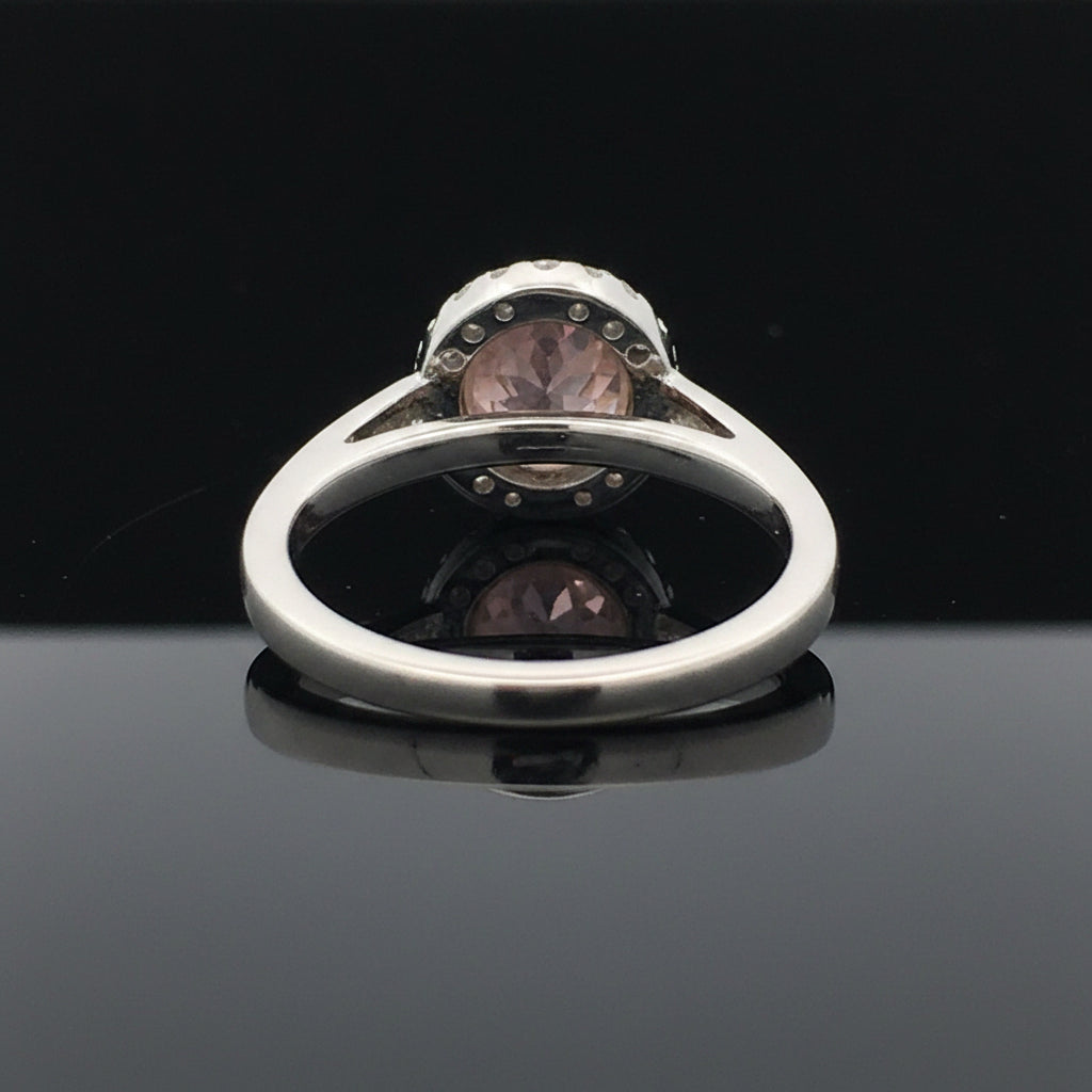 Estate Ring, 1 Radiant Cut Diamond 0.23 ct  Fancy Pink Purple SI1 GIA #2155995782, 12 Round Brilliant Cut Diamond 0.10 cttw  Fancy Pink VS1, 18 Round Brilliant Cut Diamond 0.22 cttw  G-H SI1-I1 Platinum/18K Rose Gold. All Weights Estimated.