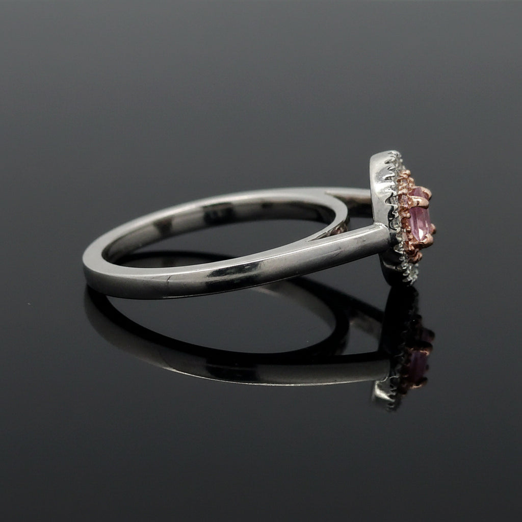 Estate Ring, 1 Radiant Cut Diamond 0.23 ct  Fancy Pink Purple SI1 GIA #2155995782, 12 Round Brilliant Cut Diamond 0.10 cttw  Fancy Pink VS1, 18 Round Brilliant Cut Diamond 0.22 cttw  G-H SI1-I1 Platinum/18K Rose Gold. All Weights Estimated.