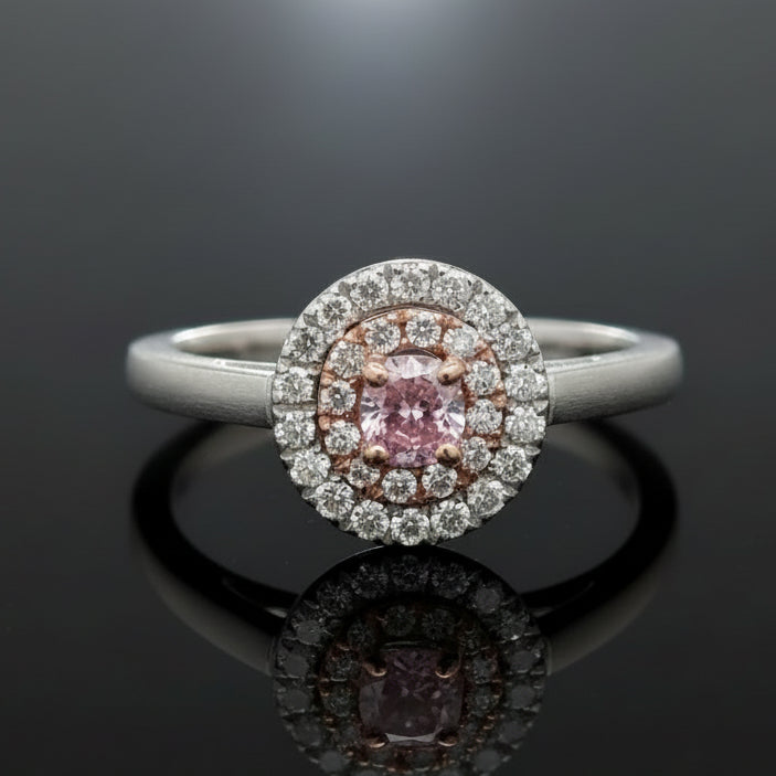 Estate Ring, 1 Radiant Cut Diamond 0.23 ct  Fancy Pink Purple SI1 GIA #2155995782, 12 Round Brilliant Cut Diamond 0.10 cttw  Fancy Pink VS1, 18 Round Brilliant Cut Diamond 0.22 cttw  G-H SI1-I1 Platinum/18K Rose Gold. All Weights Estimated.