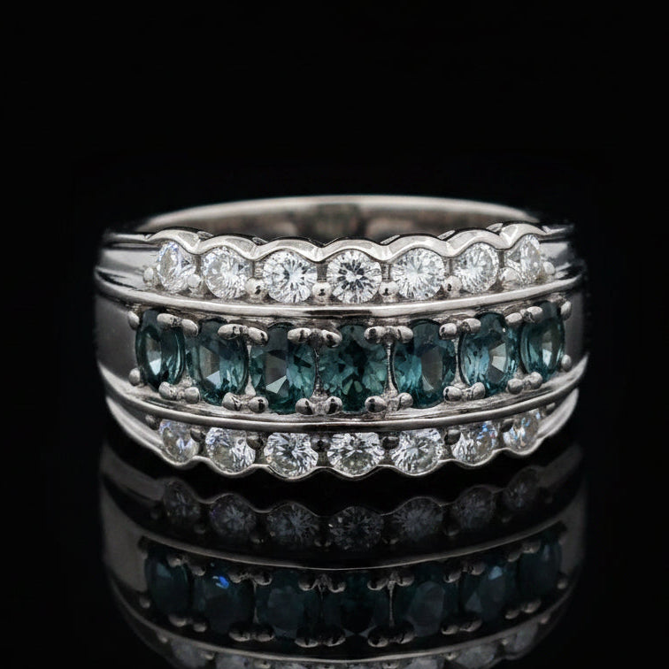 Estate Ring, Round Brilliant Cut Diamond 0.54 cttw  G-H VS1-SI1,7 Natural Alexandrite Oval 0.65 cttw  Green to Purple Blue Platinum 11.07g. All Weights Estimated.