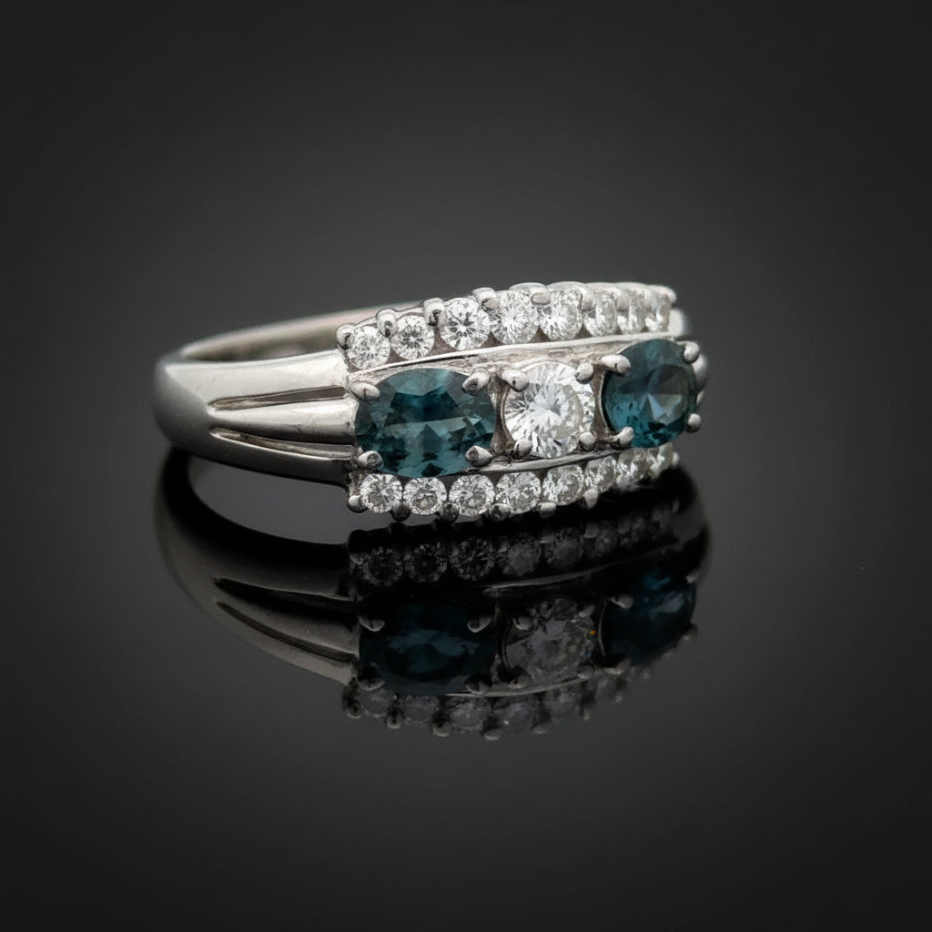 Estate Ring, Round Brilliant Cut Diamond 0.82 cttw  G-H VS1-SI1,3 Natural Alexandrite Oval 0.98 cttw Color Change Blue to Purple Platinum 9.20g. All Weights Estimated.