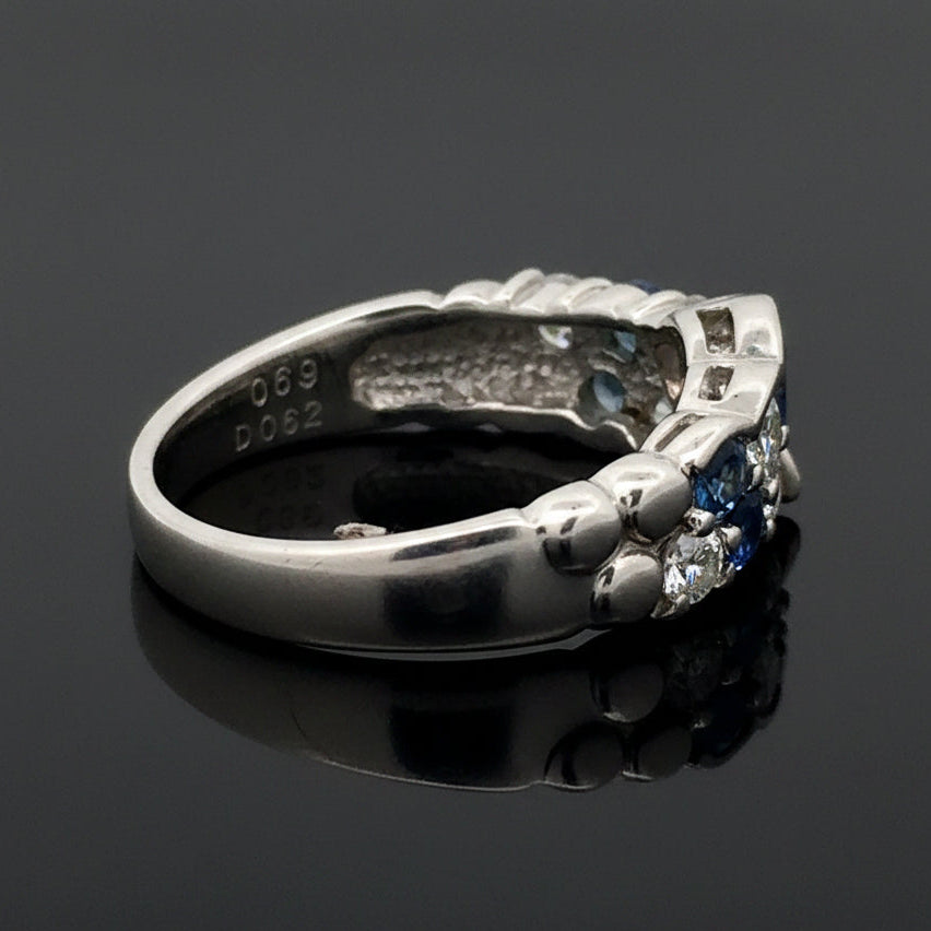 Estate Ring, 6 Round Brilliant Cut Diamond 0.62 cttw  G VS1,6 Natural Alexandrite Round 0.69 cttw Color Change Blue to Purple Platinum 6.31g. All Weights Estimated.