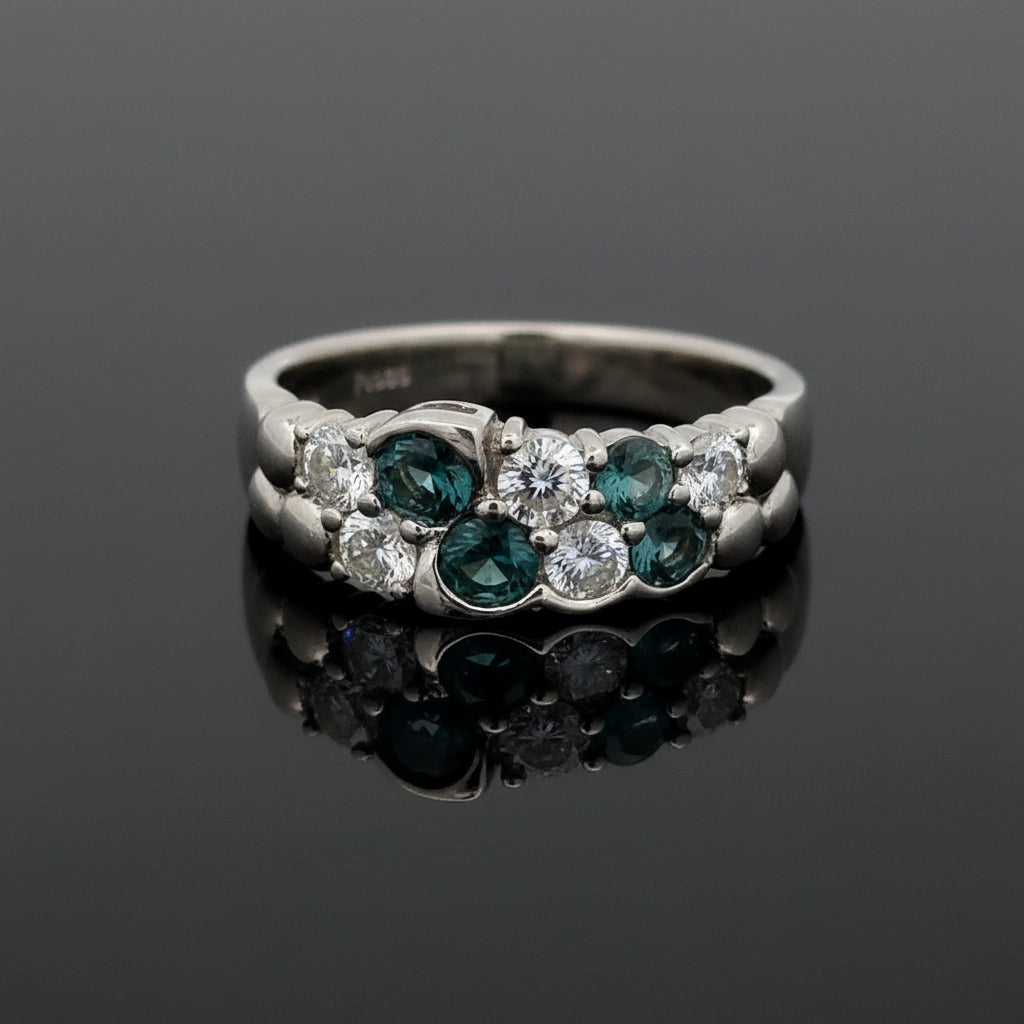 Estate Ring, 6 Round Brilliant Cut Diamond 0.62 cttw  G VS1,6 Natural Alexandrite Round 0.69 cttw Color Change Blue to Purple Platinum 6.31g. All Weights Estimated.