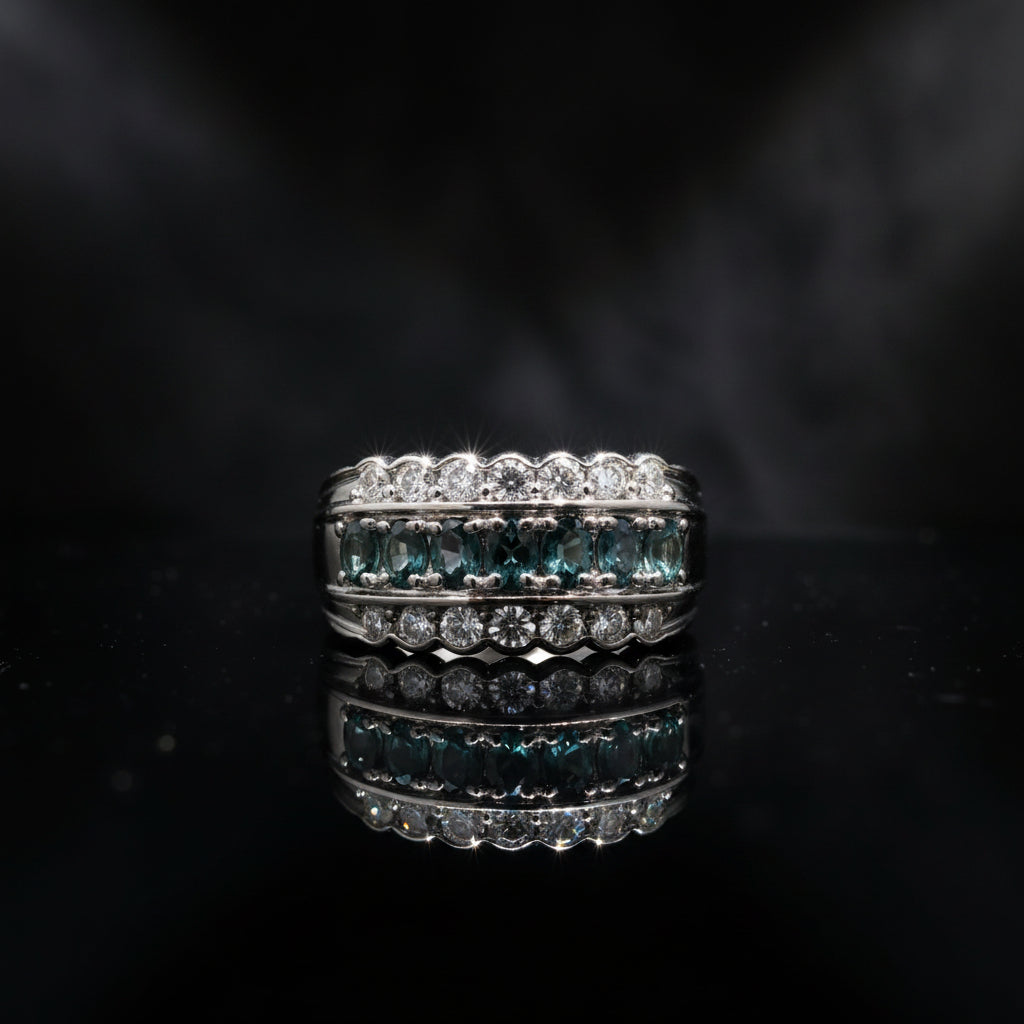 Estate Ring, Round Brilliant Cut Diamond 0.54 cttw  G-H VS1-SI1,7 Natural Alexandrite Oval 0.65 cttw  Green to Purple Blue Platinum 11.07g. All Weights Estimated.