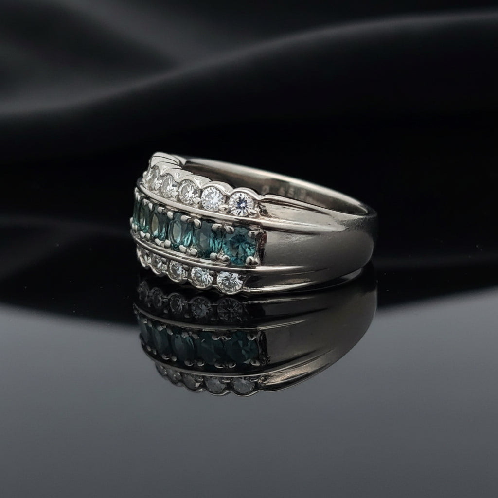 Estate Ring, Round Brilliant Cut Diamond 0.54 cttw  G-H VS1-SI1,7 Natural Alexandrite Oval 0.65 cttw  Green to Purple Blue Platinum 11.07g. All Weights Estimated.