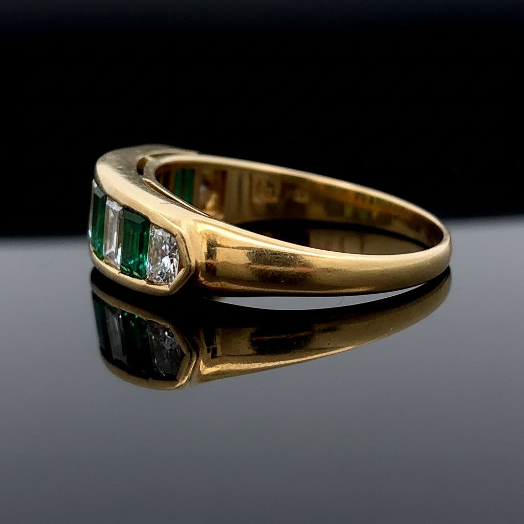 Estate Ring, 2 Tapered Baguette Cut Diamond and 2 Cadillac Cut Diamond 1.02 cttw  VS2-SI1, 3 Fine Emerald Cushion Cut 2.40 cttw  Green 18K Yellow Gold 6.94g. All Weights Estimated.