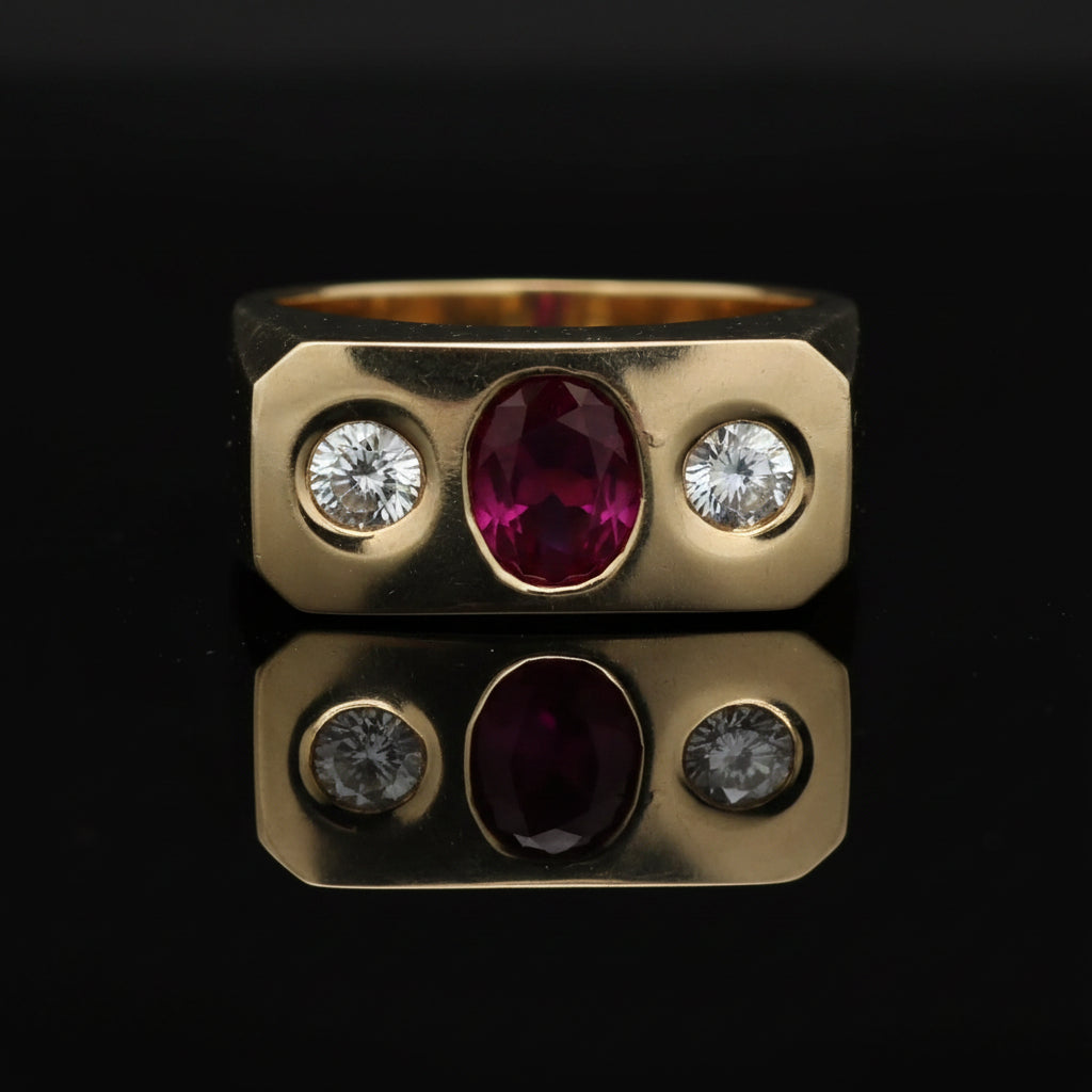 Estate Ring, 2 Round Brilliant Cut Diamond 0.70 cttw  F-G VS1-SI1, 1 Ruby Oval 1.74 ct Fine Red Pigeon Blood 14K Yellow Gold 24.72g. All Weights Estimated.