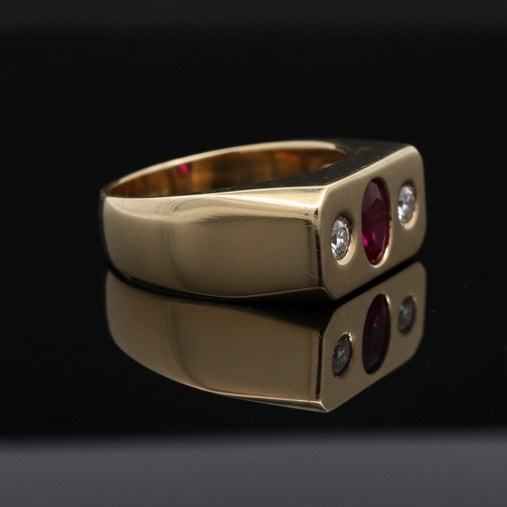 Estate Ring, 2 Round Brilliant Cut Diamond 0.70 cttw  F-G VS1-SI1, 1 Ruby Oval 1.74 ct Fine Red Pigeon Blood 14K Yellow Gold 24.72g. All Weights Estimated.