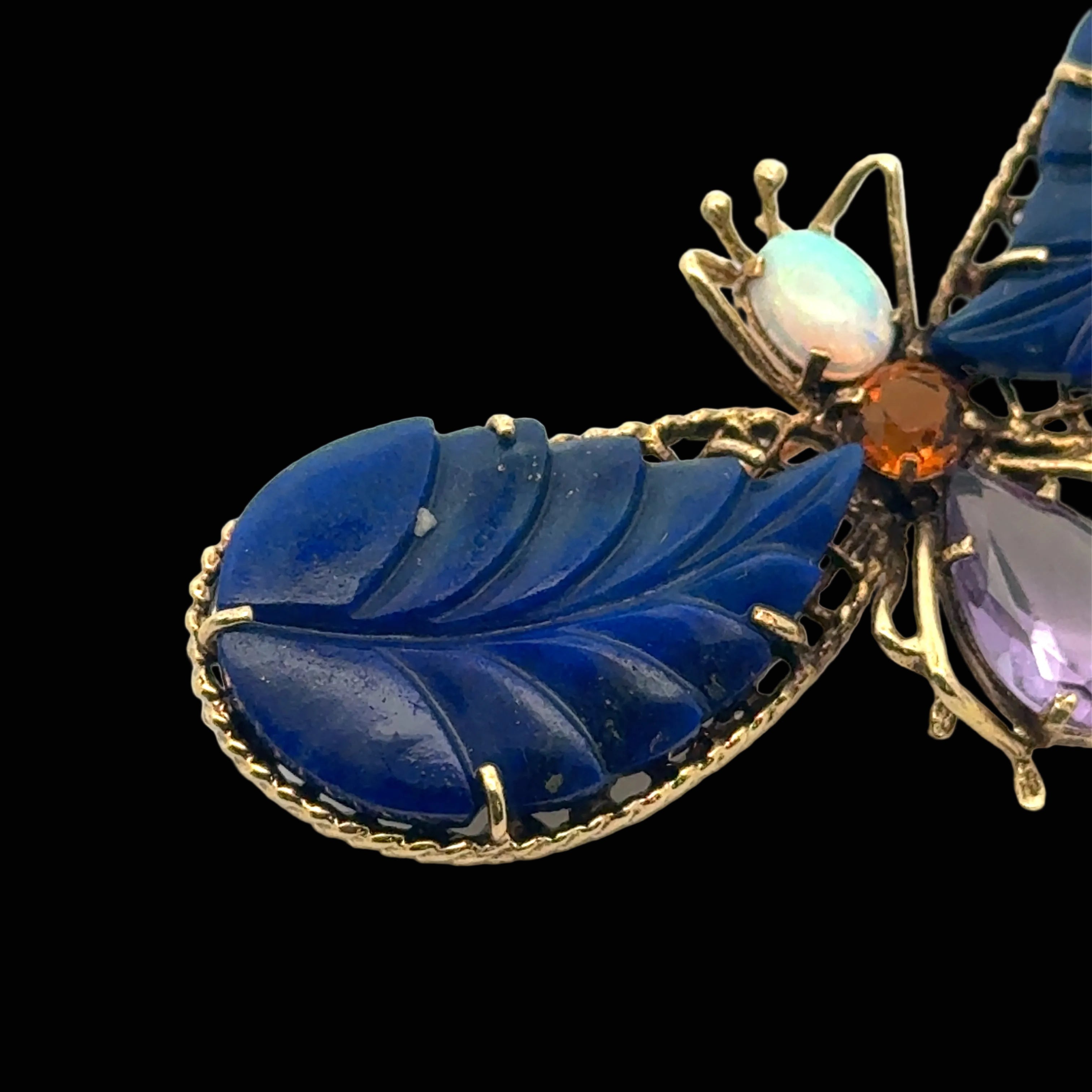 Estate Brooch/Pendant,1 Opal Cabochon 0.60 ct , 1 Amethyst Pear Shape 3.00 ct , 2 Carved Lapis Lazuli, 1 Citrine Round 0.50 ct  14K Yellow Gold 14.10g. All Weights Estimated.