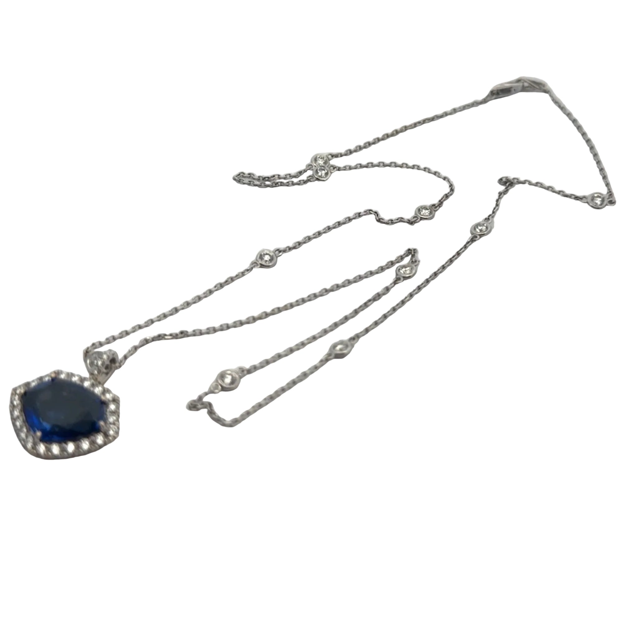 Estate Necklace, 36 Round Brilliant Cut Diamond 1.40 cttw  G-H VS1-SI1, 1 Sapphire Shield Cut Madagascar Heated 5.49 ct  GIA #1162003235 18K White Gold 7.39g. All Weights Estimated.