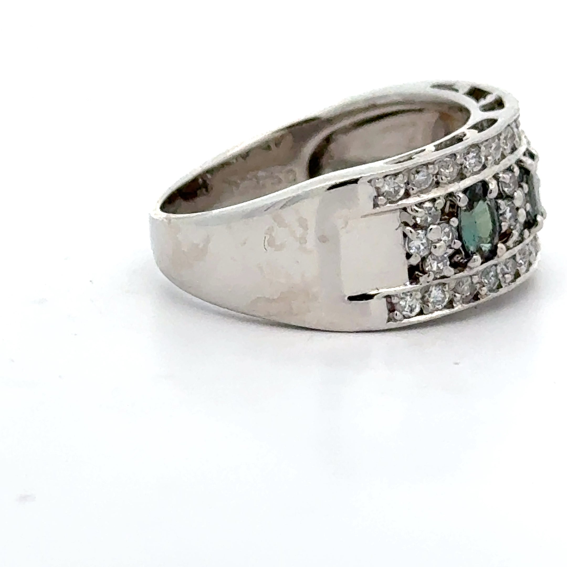 Estate Ring, 8 Round Brilliant Cut Diamond 0.24 cttw  H-J SI1-SI2,8 Alexandrite 0.28 cttw  Color Change Blue to Purple Platinum 5.61g. All Weights Estimated.