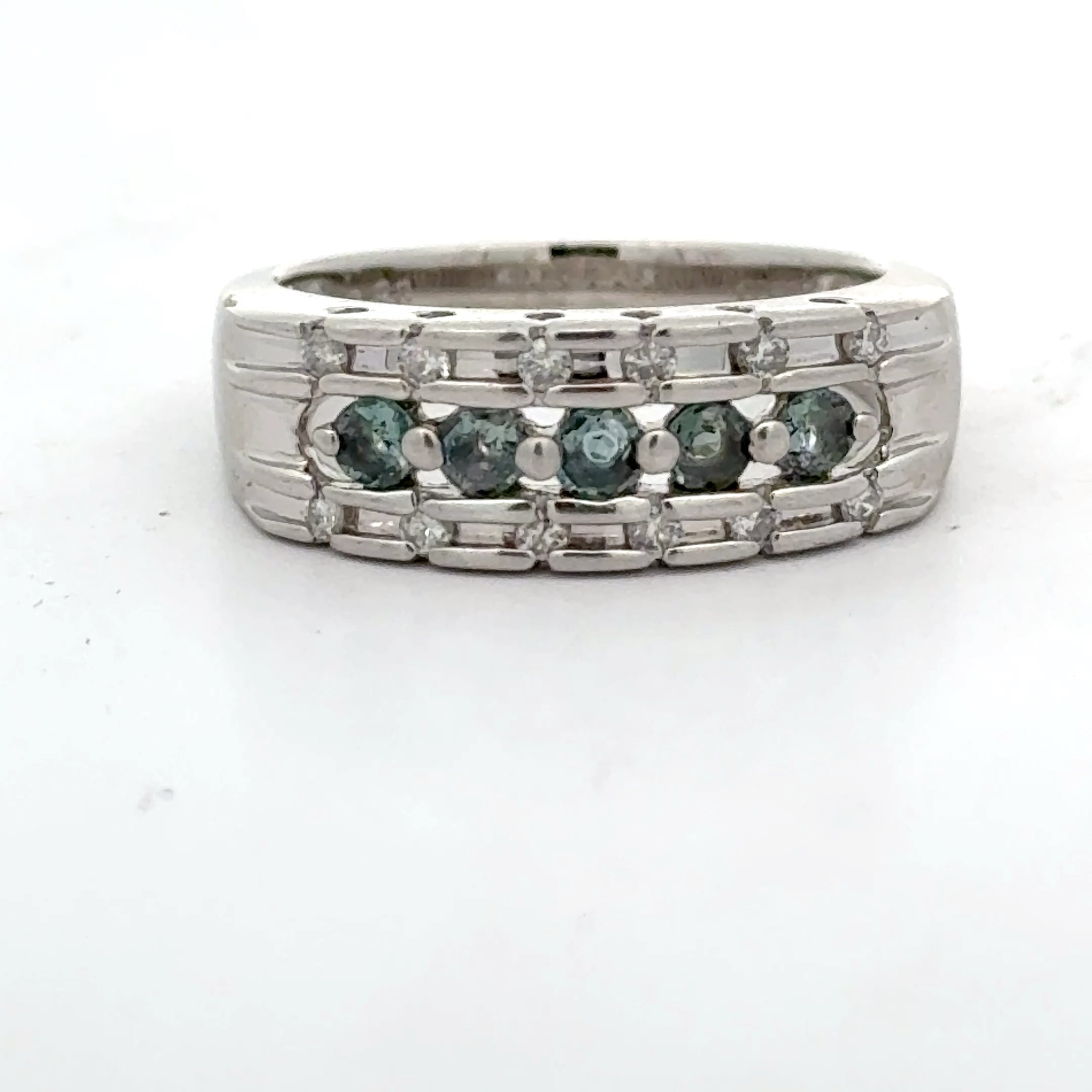 Estate Ring, Round Brilliant Cut Diamond 0.13 cttw  G-H SI1, Alexandrite Round 0.26 cttw  Color Change Blue/Green to Purple Platinum 6.16g. All Weights Estimated.