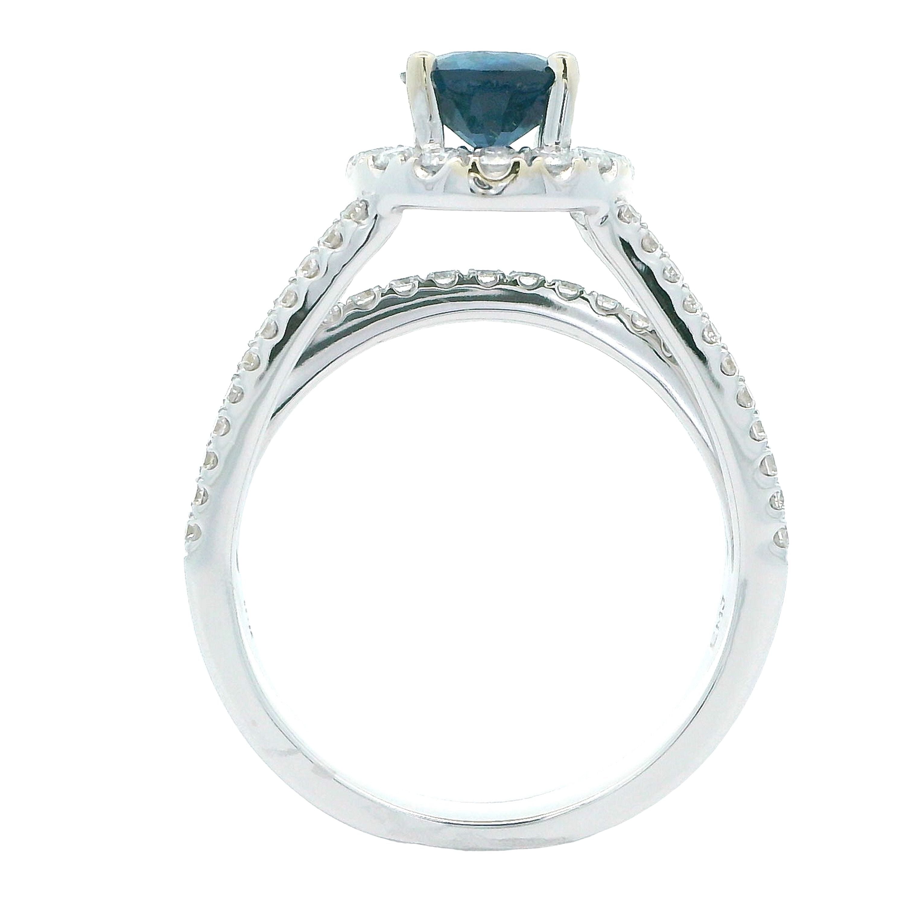 EMJ Halo Ring, 1 Round Sapphire 1.25ct, Round Diamond 0.74ct  E-F VS1-VS2, 18K White Gold 6.07g