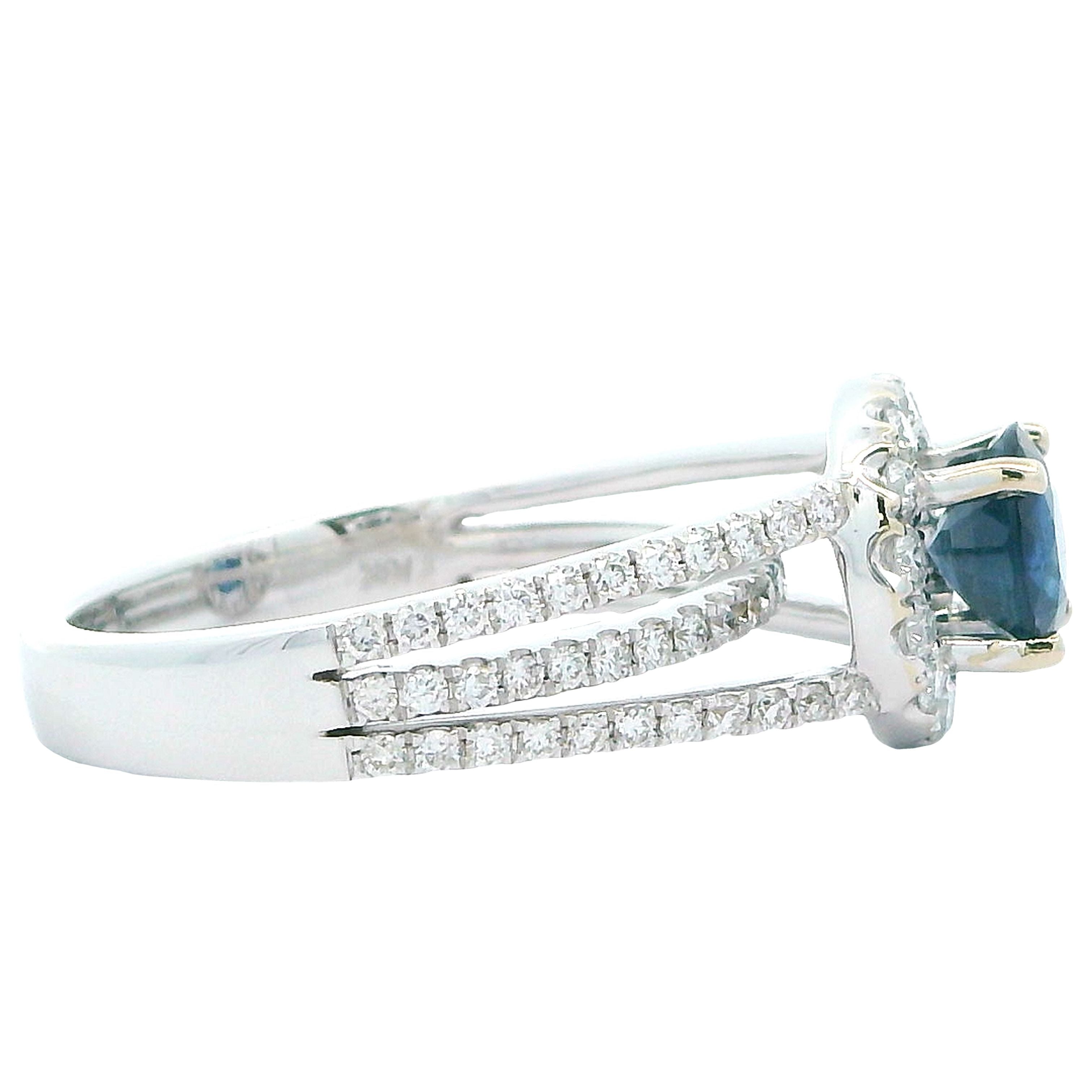 EMJ Halo Ring, 1 Round Sapphire 1.25ct, Round Diamond 0.74ct  E-F VS1-VS2, 18K White Gold 6.07g