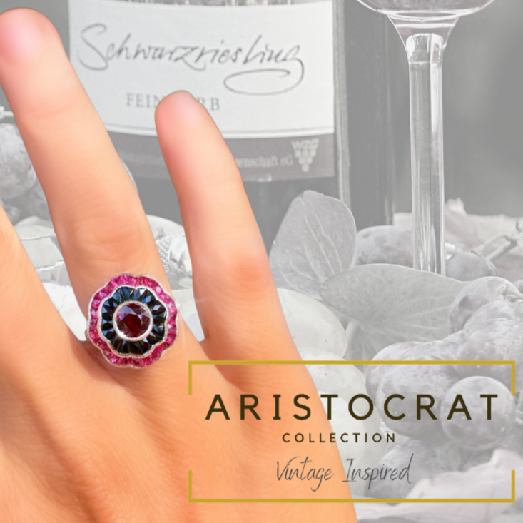 Ring, 6 Round Diamond 0.07 cttw, 1 Round Ruby 1.37 ct, Ruby 1.35 cttw, Onyx 1.44 cttw, 18K White Gold 4.95g