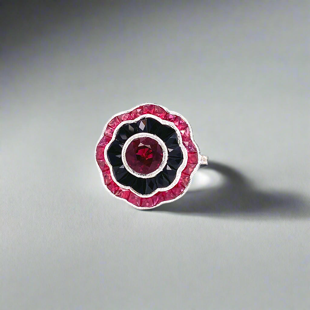 Ring, 6 Round Diamond 0.07 cttw, 1 Round Ruby 1.37 ct, Ruby 1.35 cttw, Onyx 1.44 cttw, 18K White Gold 4.95g