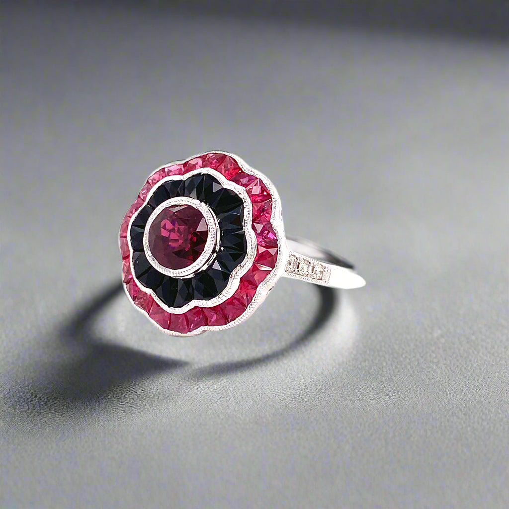 Ring, 6 Round Diamond 0.07 cttw, 1 Round Ruby 1.37 ct, Ruby 1.35 cttw, Onyx 1.44 cttw, 18K White Gold 4.95g
