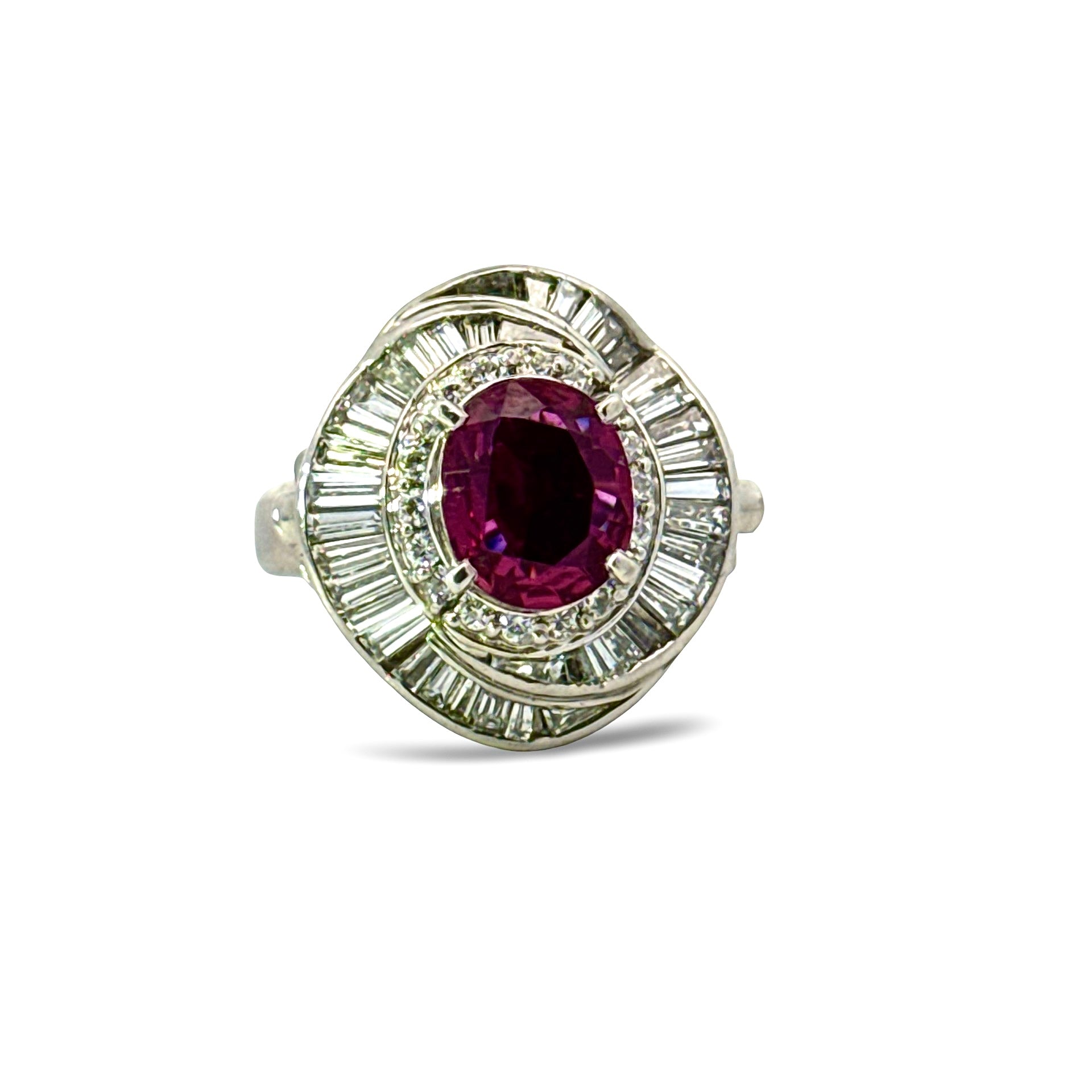 Estate Ring, Round/Baguette Cut Diamonds 1.28cttw G-H VS1-SI1,1 Ruby Oval 1.70ct,  Platinum 13.85g. Weights are estimated.