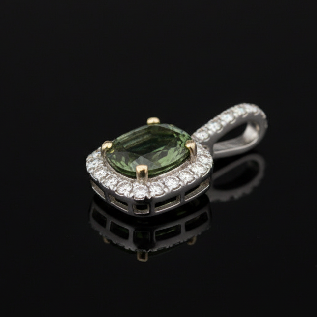 Estate Pendant, Round Brilliant Cut Diamonds 0.25cttw H-I VS2-SI1, 1 Alexandrite Oval 1.11ct Color Changing Bluish Green - Purple GIA #2215252609, 14K White/Yellow Gold 1.82g. All weights estimated.