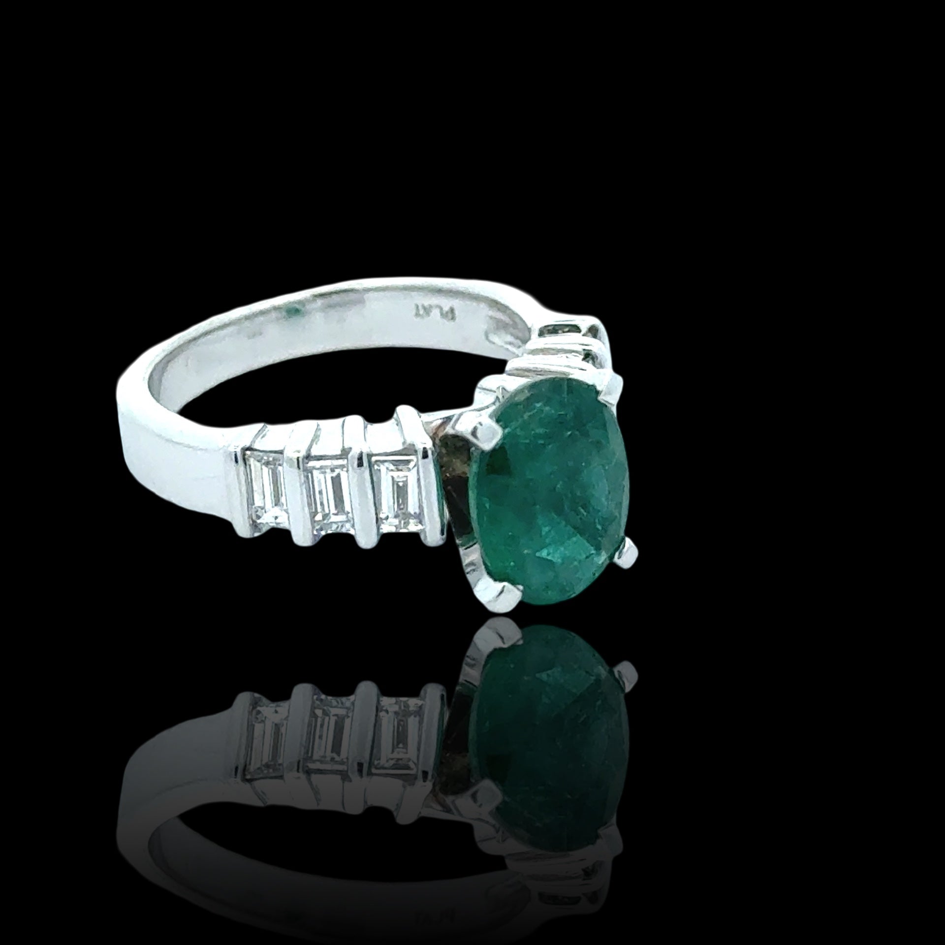 Estate Ring, 1 Emerald Oval 2.35 ct, 6 Baguette Cut Diamond 0.78 ct  G-H VS1-SI1,  Platinum 10.13g. Size 6.75