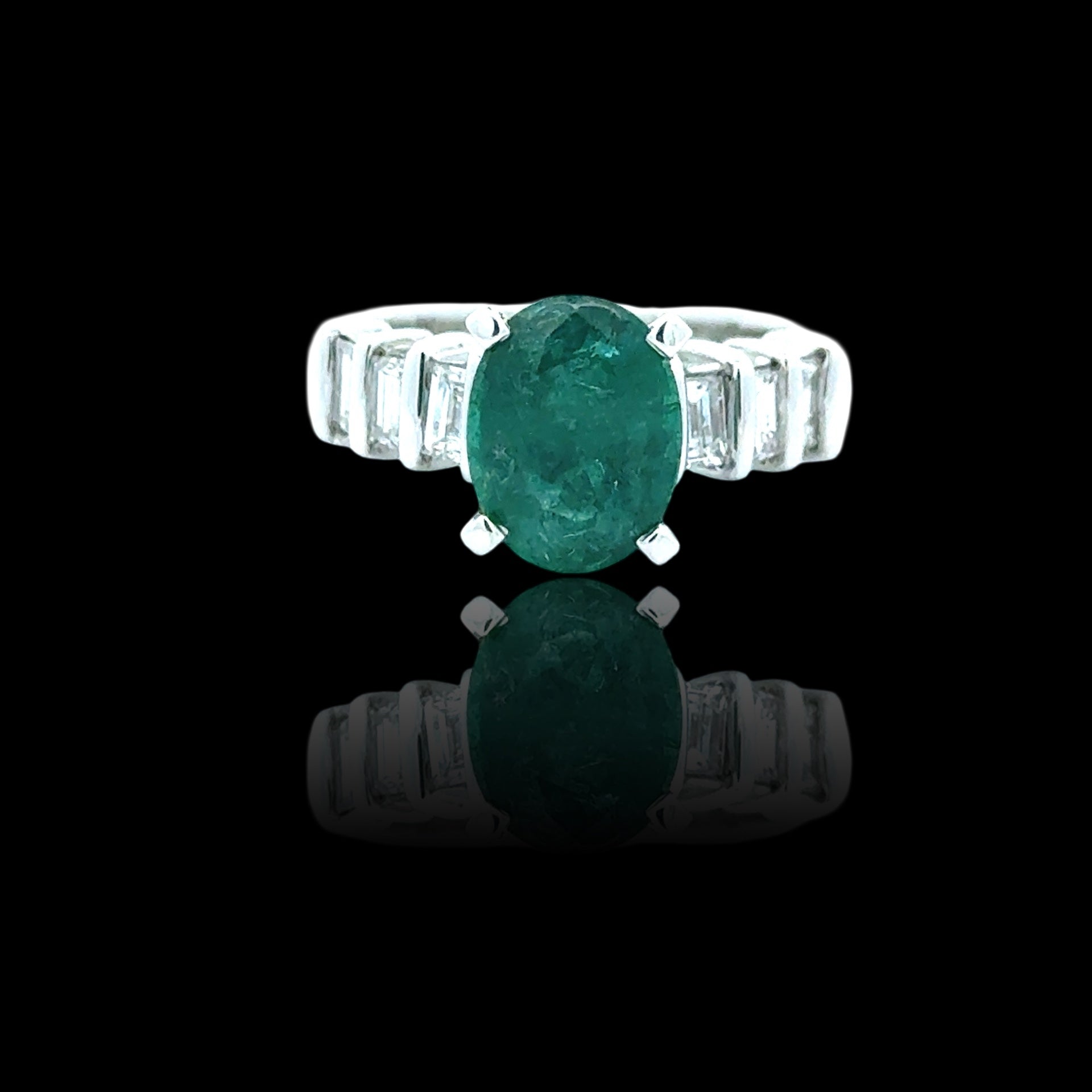 Estate Ring, 1 Emerald Oval 2.35 ct, 6 Baguette Cut Diamond 0.78 ct  G-H VS1-SI1,  Platinum 10.13g. Size 6.75