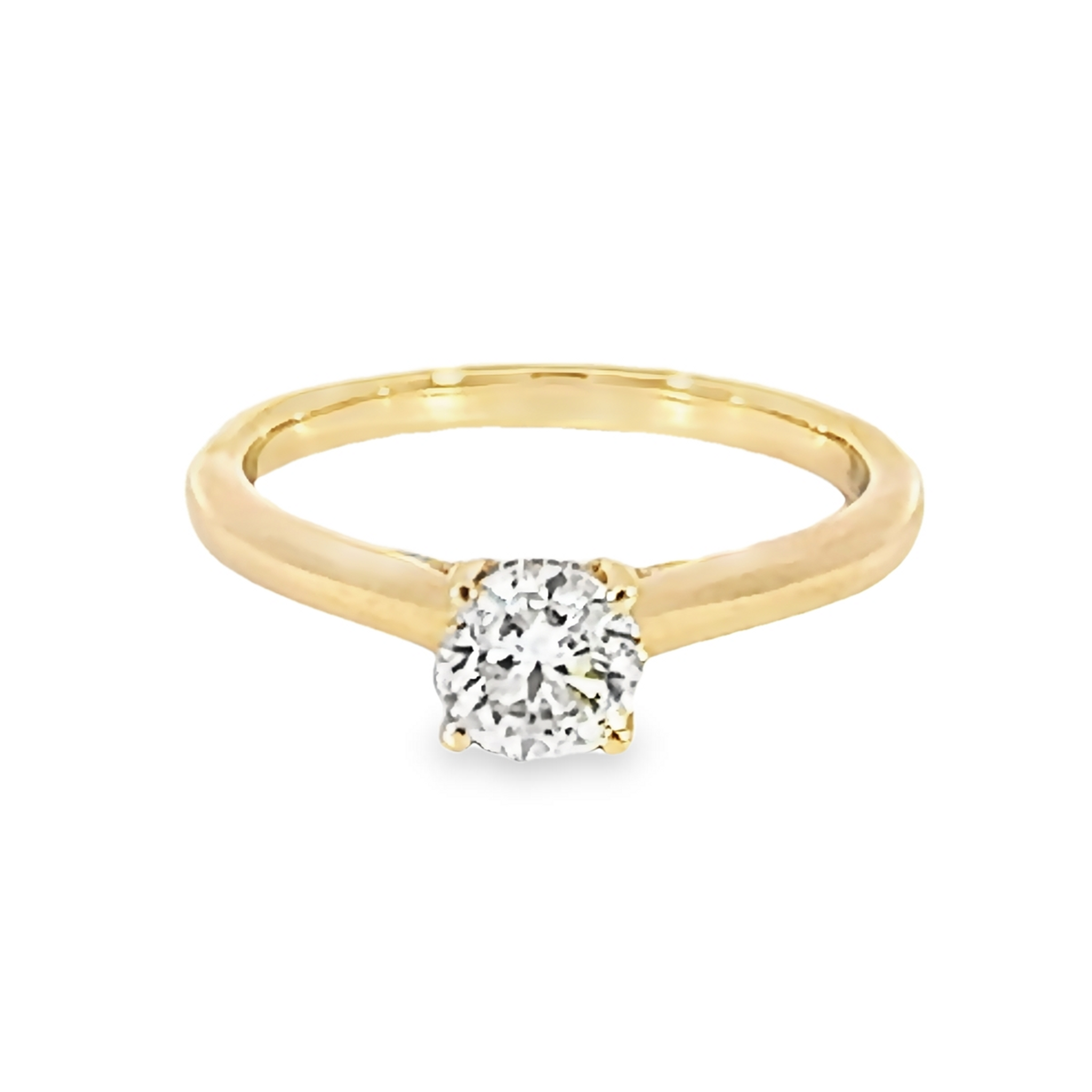 14 Karat yellow gold engagement ring with One 0.71Ct Round Brilliant K SI1 Diamond And 26=0.06 total weight Round Brilliant G SI Diamonds