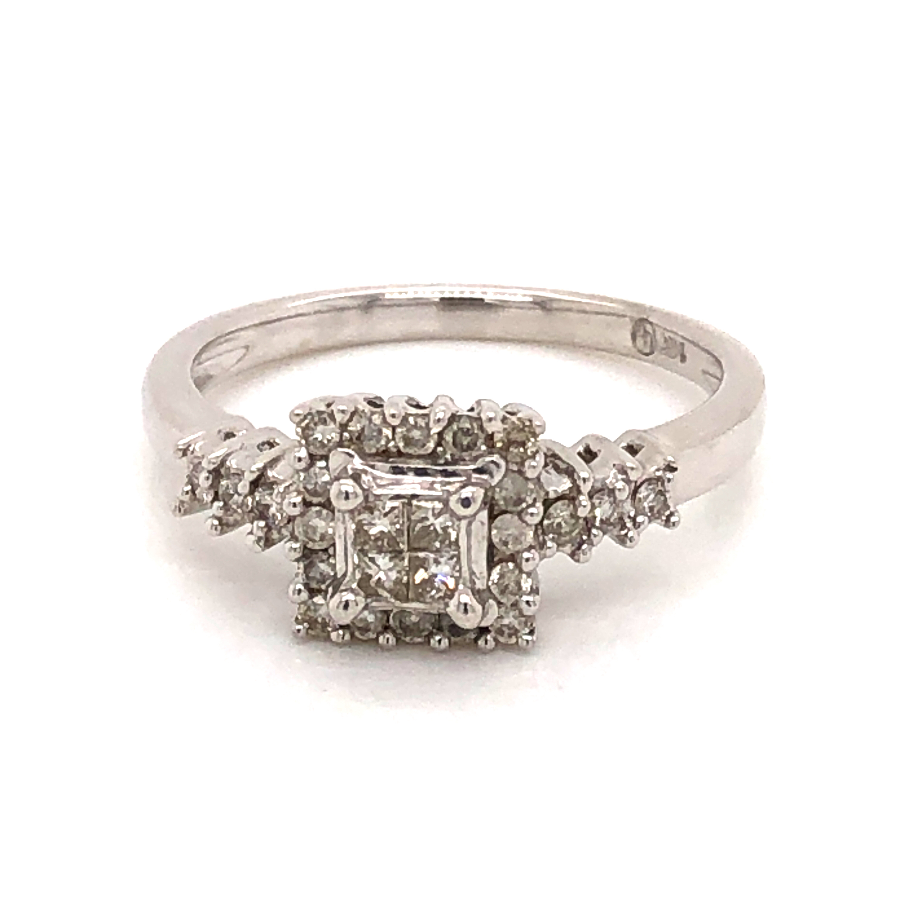 14 Karat white gold engagement ring with 4=0.20tw princess I VS Diamonds and 22=0.30tw round brilliant H SI Diamonds