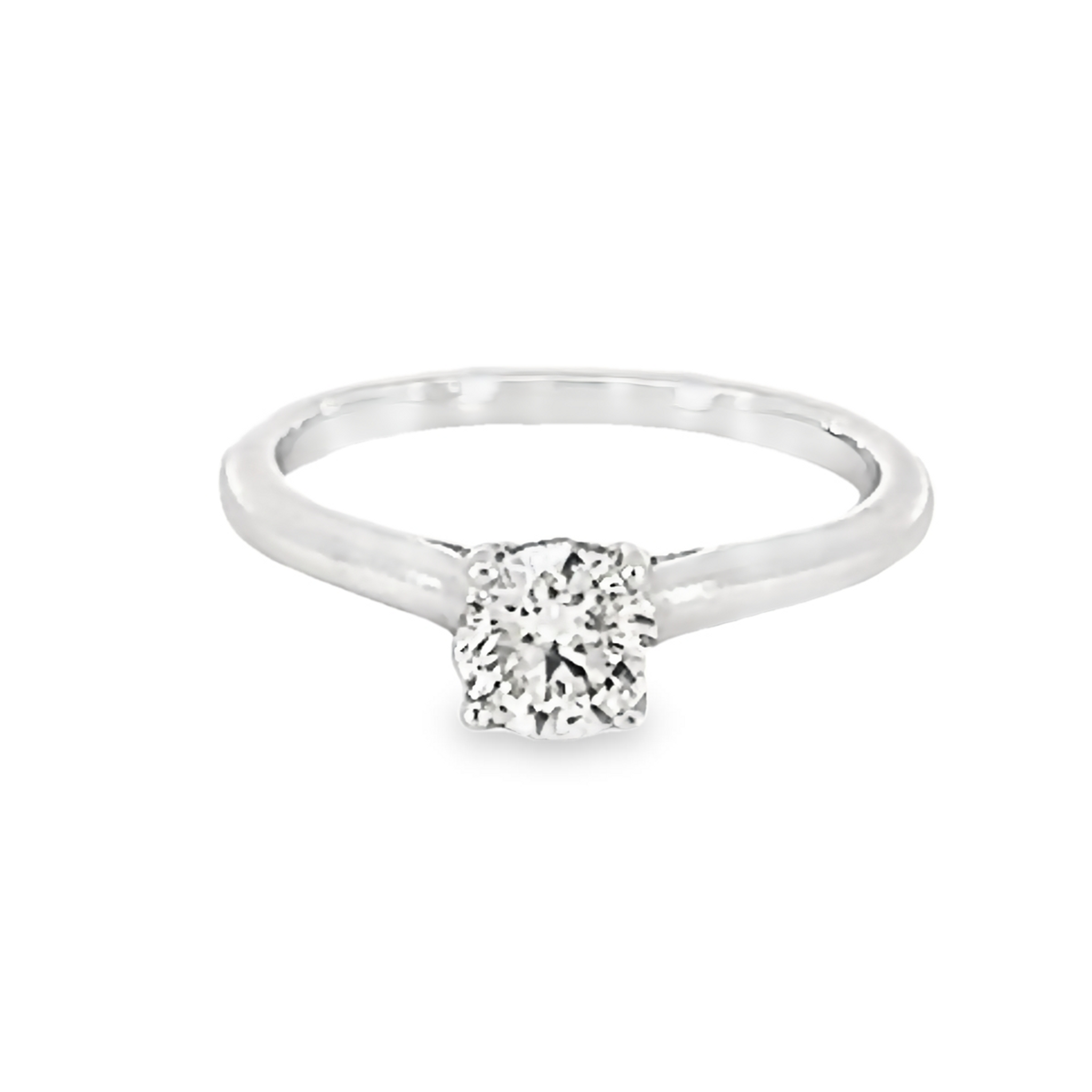 14 Karat white gold engagement ring with One 0.71Ct Round Brilliant J I1 Diamond And 26=0.06 total weight Round Brilliant G SI Diamonds. Size 7