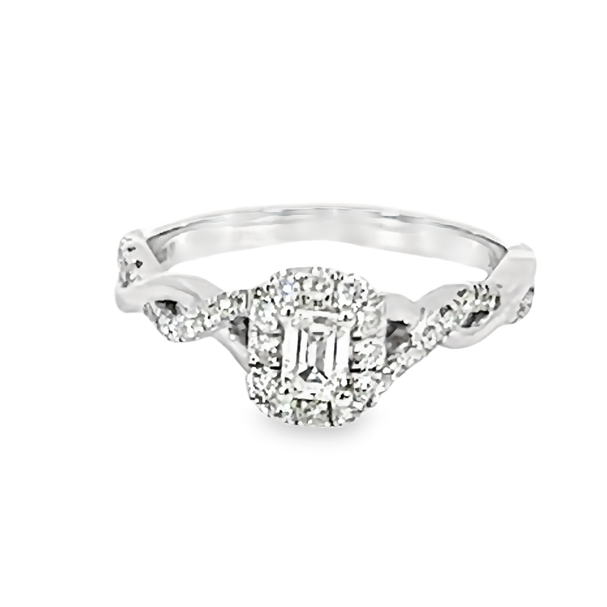 Engagement ring with One 0.20Ct Emerald J SI1 Diamond and 32=0.35 total weight round brilliant G SI Diamonds