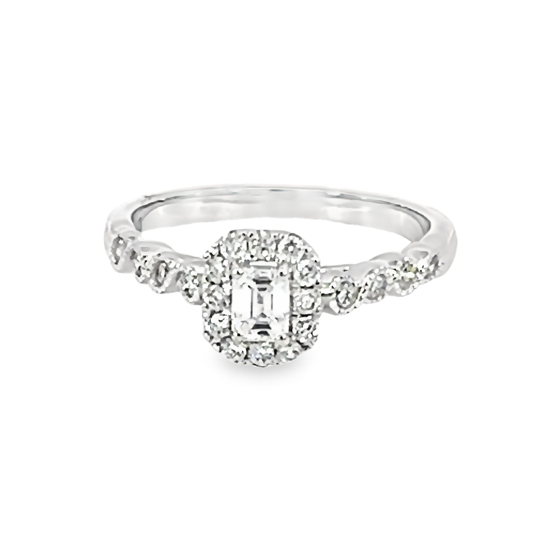 14 Karat white gold engagement ring with One 0.15Ct emerald F SI2 Diamond and 20=0.35 total weight round brilliant G SI Diamonds