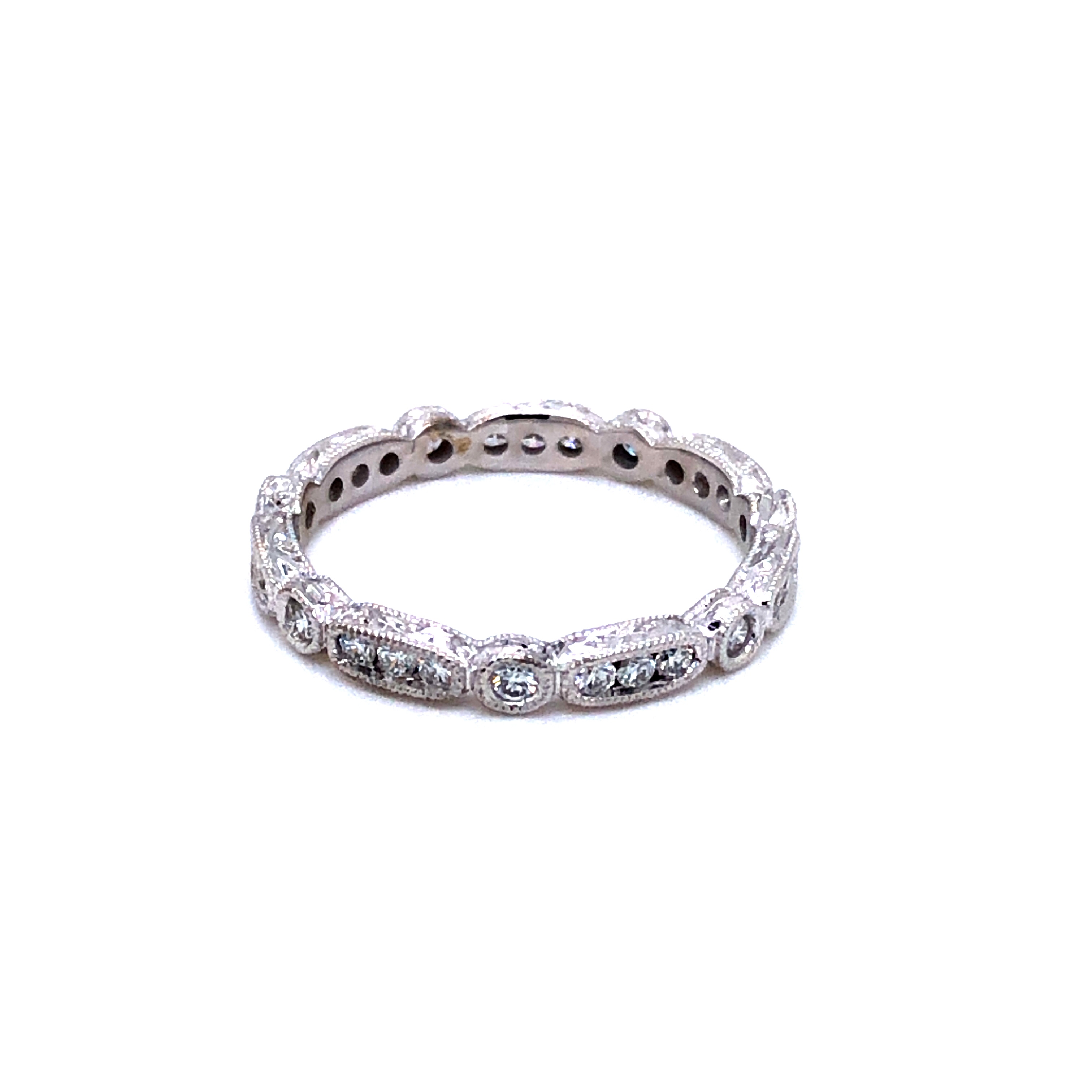 14 Karat white gold Wedding Band With 28=0.35Tw Round Brilliant G VS Diamonds.