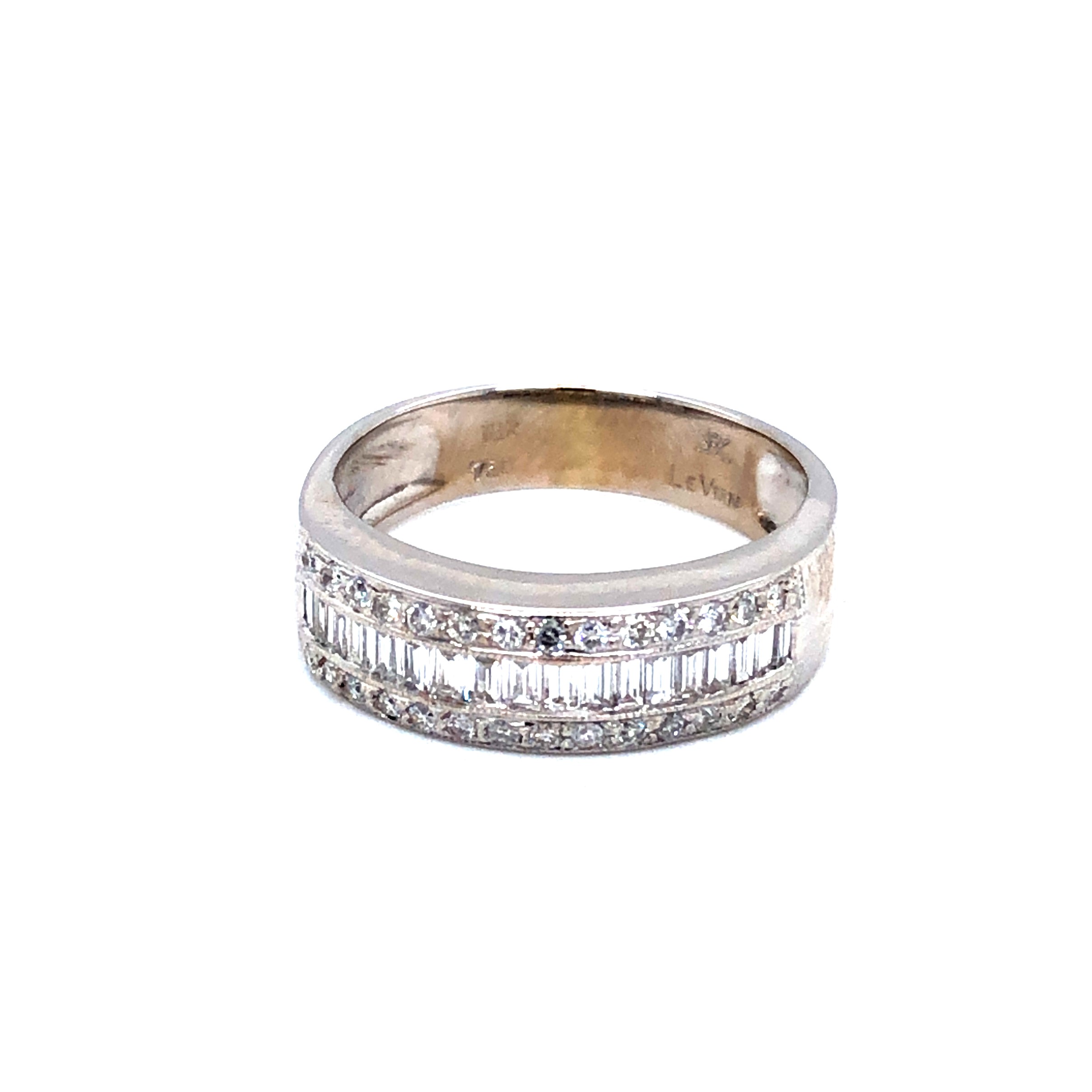 14 Karat white gold Wedding Band With 18=0.60Tw Baguette G VS Diamonds And 28=0.40Tw Round Brilliant G SI Diamonds