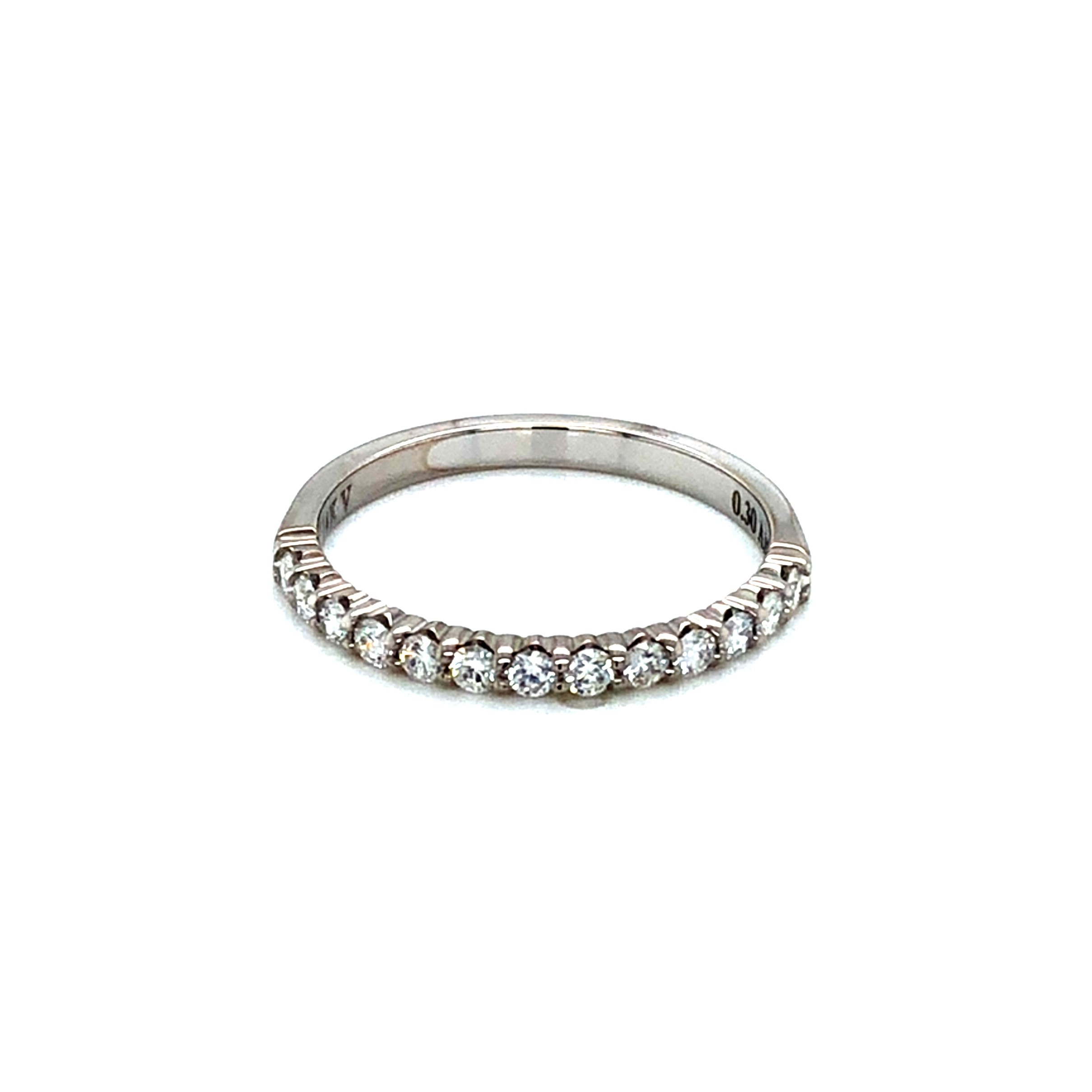 14 Karat white gold wedding band with 13=0.30tw round brilliant g vs Diamonds. Size 6.5