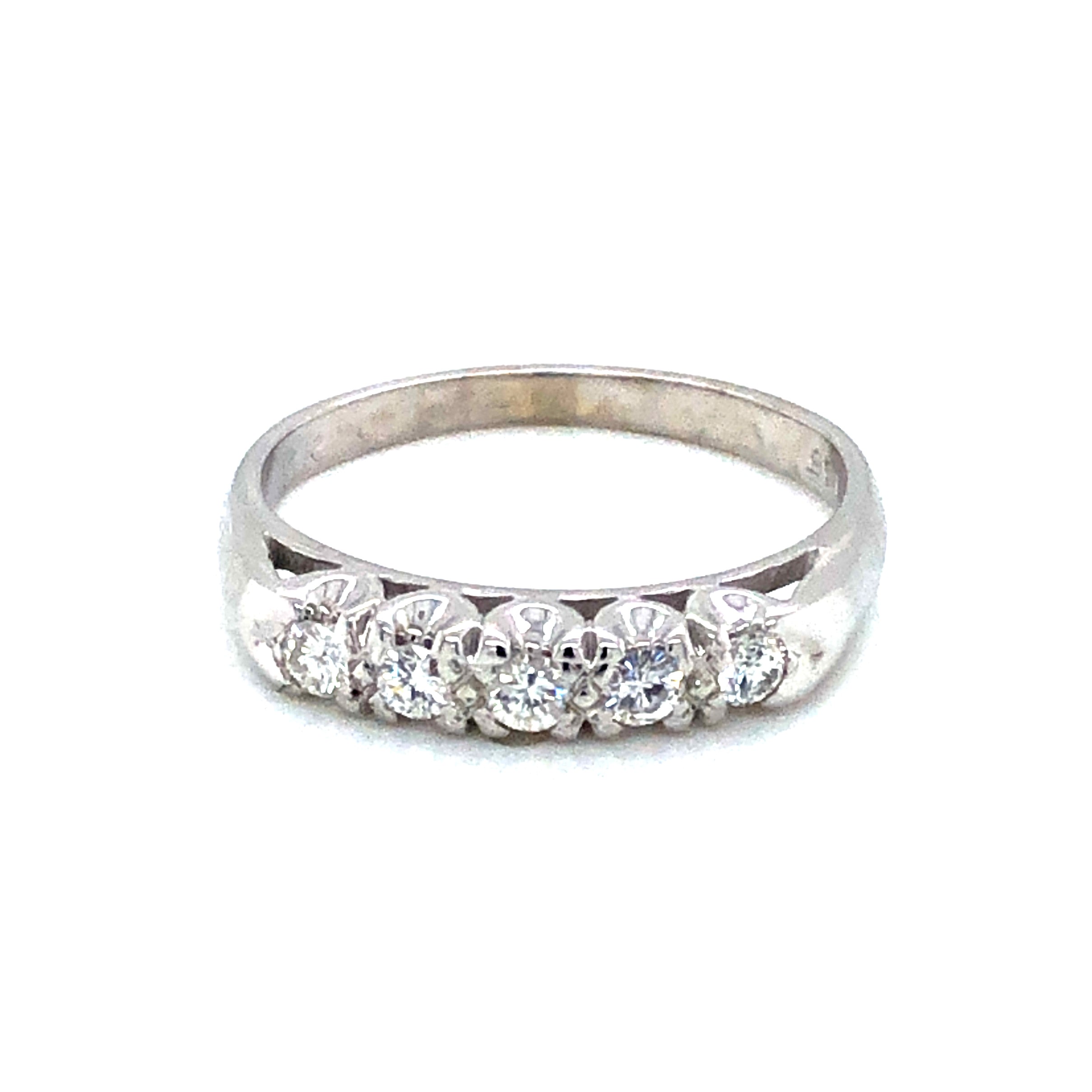 14 Karat white gold wedding band with 5=0.25Tw Round Brilliant G SI Diamonds