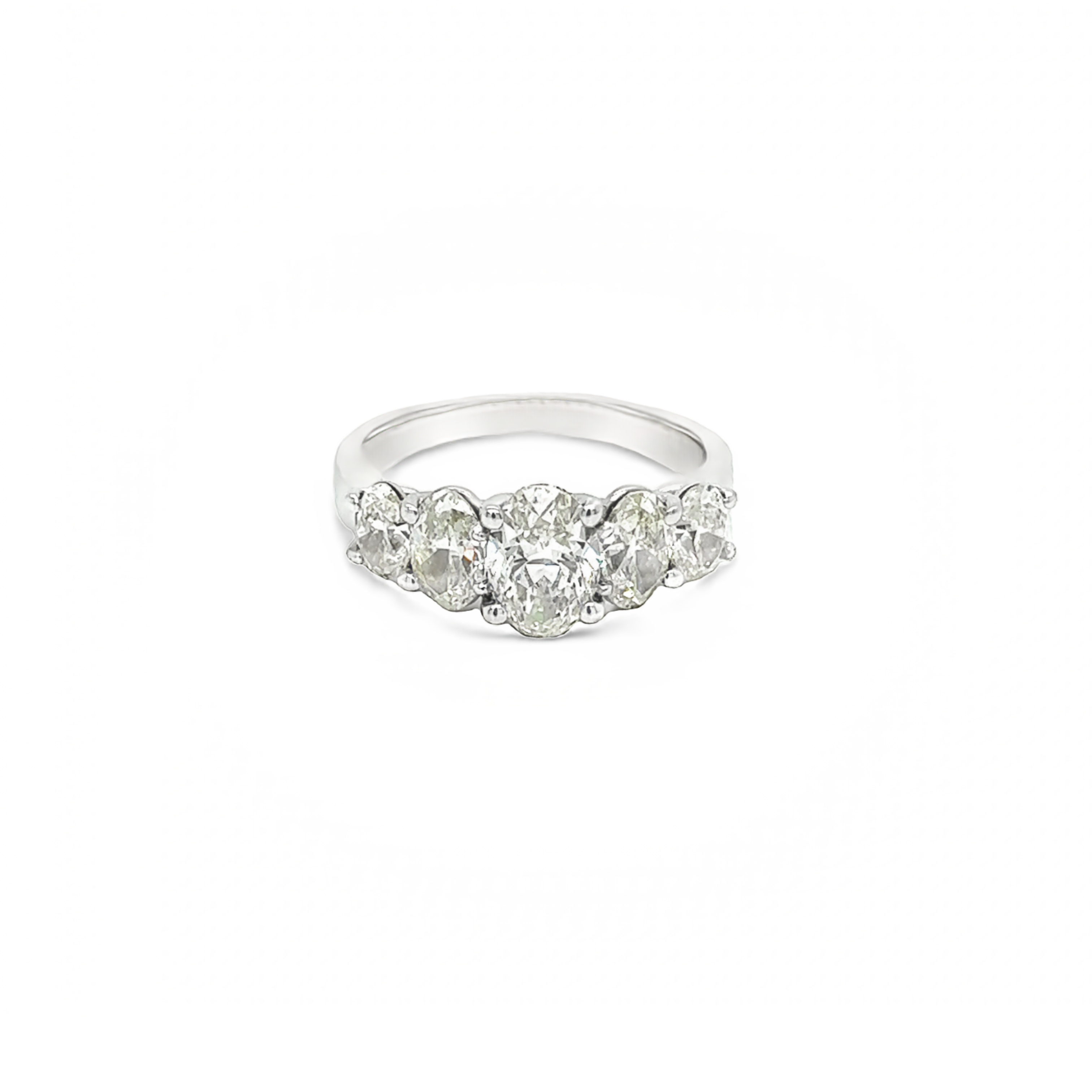 14 Karat white gold ring  with 5=2.76tw Oval J VS Diamonds graduated in size.