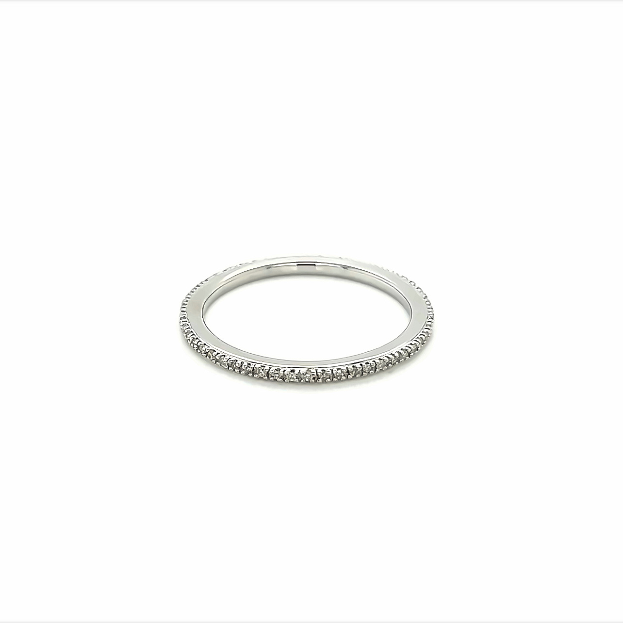 14 Karat white gold eternity wedding band Size 7 set with 55=0.50tw Single Cut G VS Diamonds.