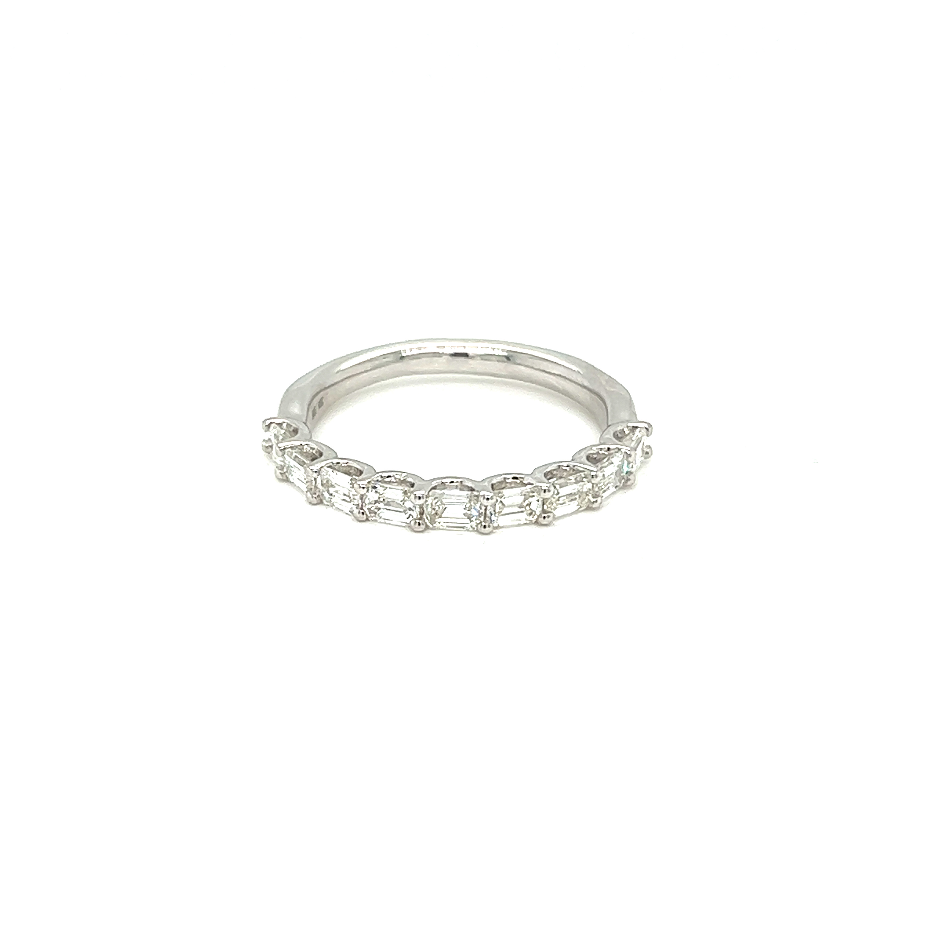 14 Karat white gold wedding band with 9=0.95tw Emerald G VS Diamonds
