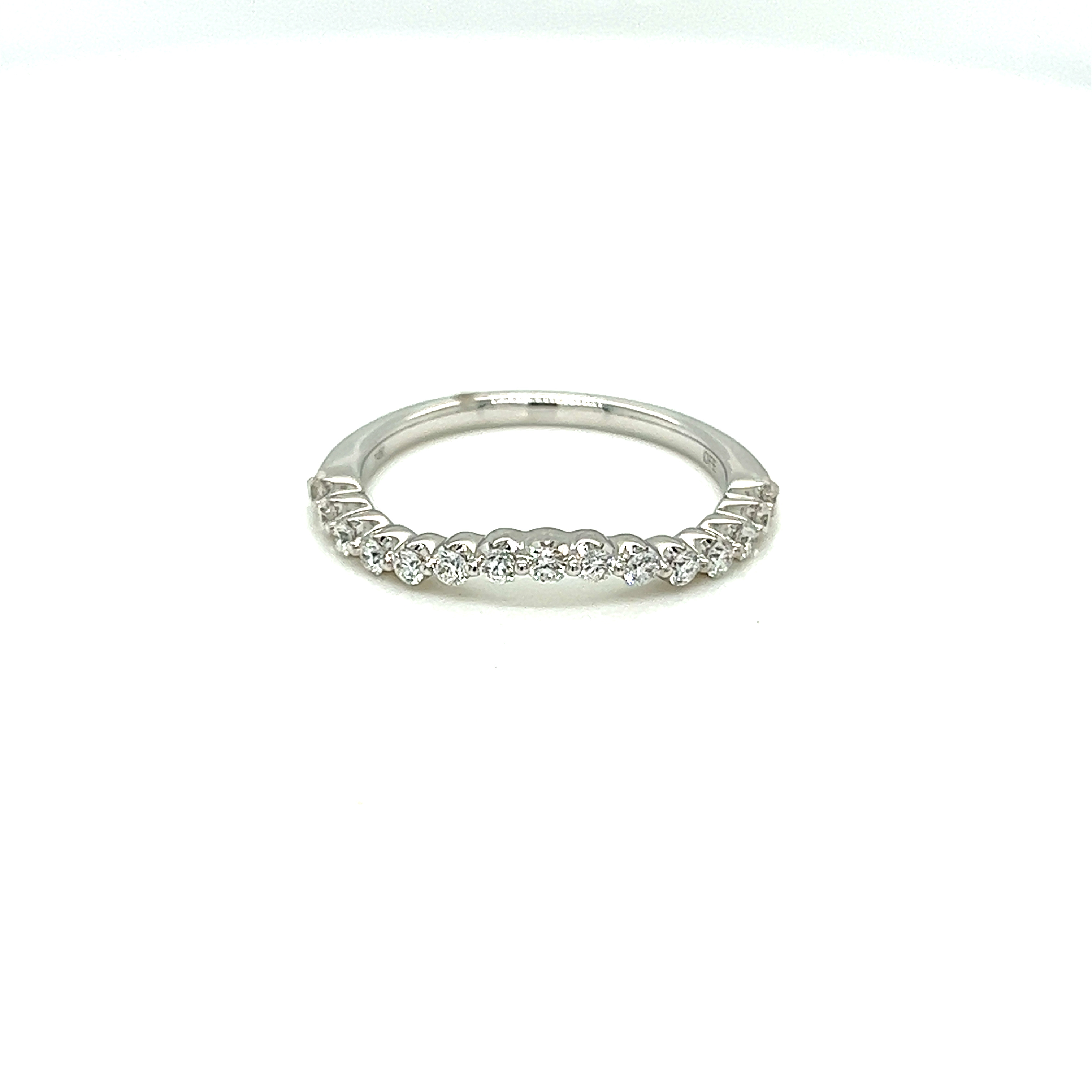 14 Karat white gold curved wedding band Size 6.5 with 15=0.35tw Round Brilliant G VS Diamonds
