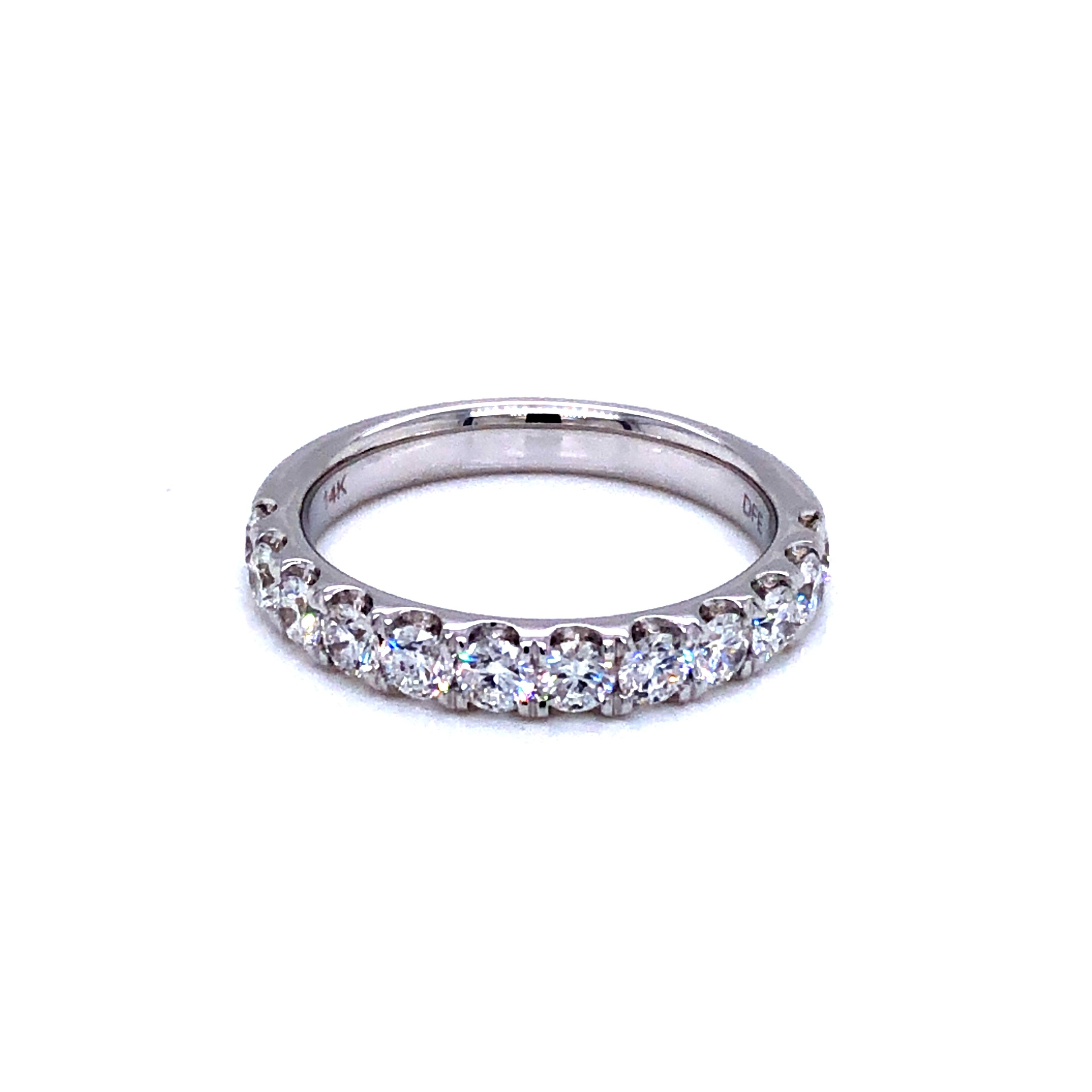 14 Karat white gold wedding band with 12=1.00TW Round Brilliant G VS Diamonds.