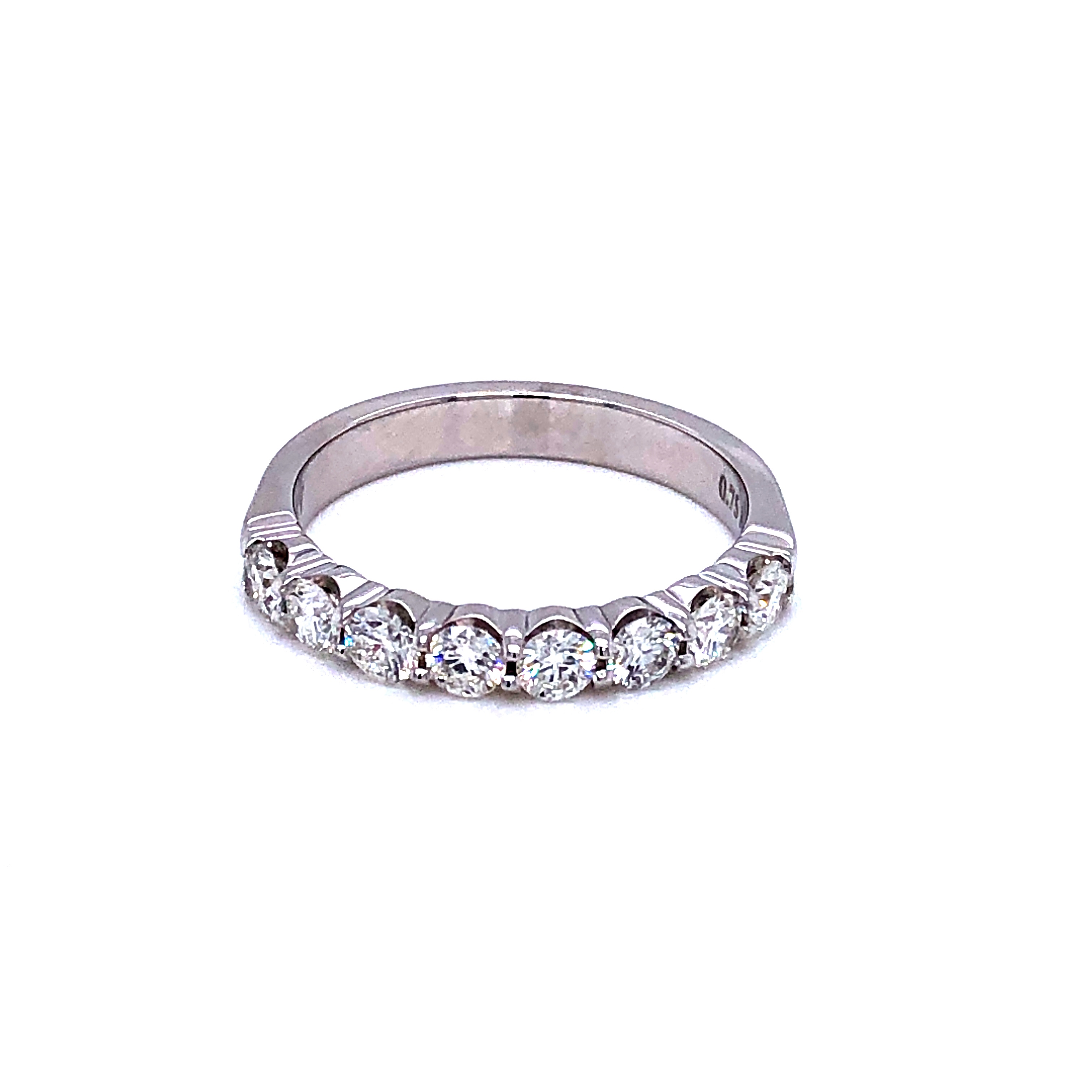 14 Karat white gold wedding band with 8=0.75TW Round Brilliant G VS Diamonds