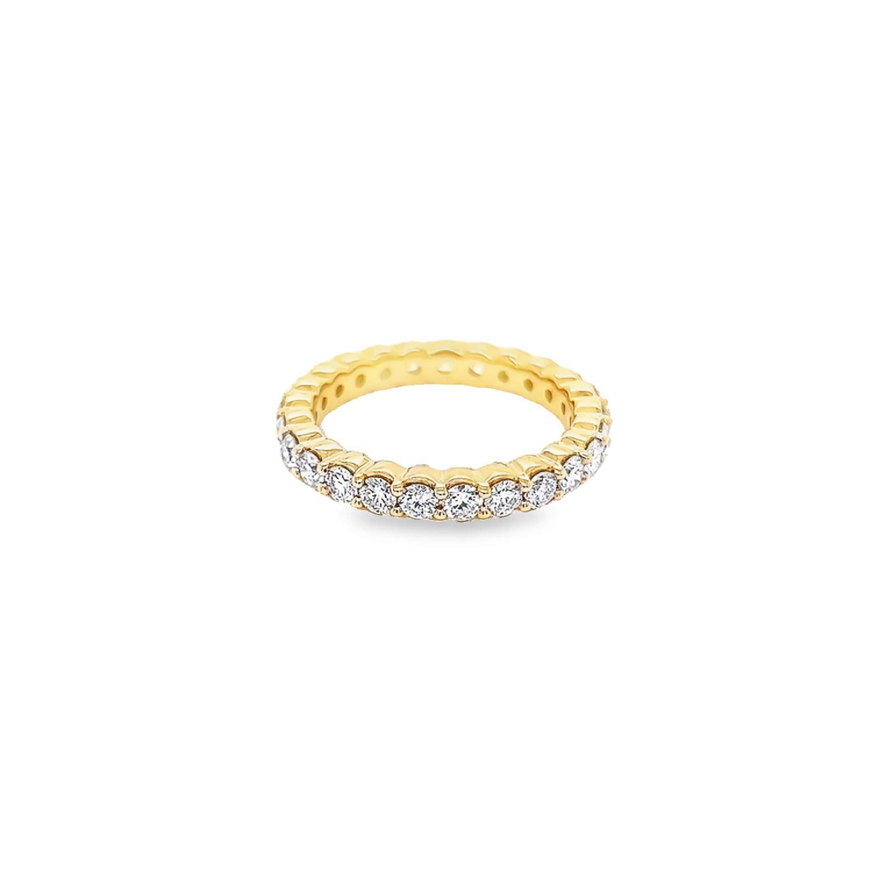 14 Karat yellow gold eternity wedding band Size 6.75 with 25=1.63 total weight round brilliant G SI Diamonds