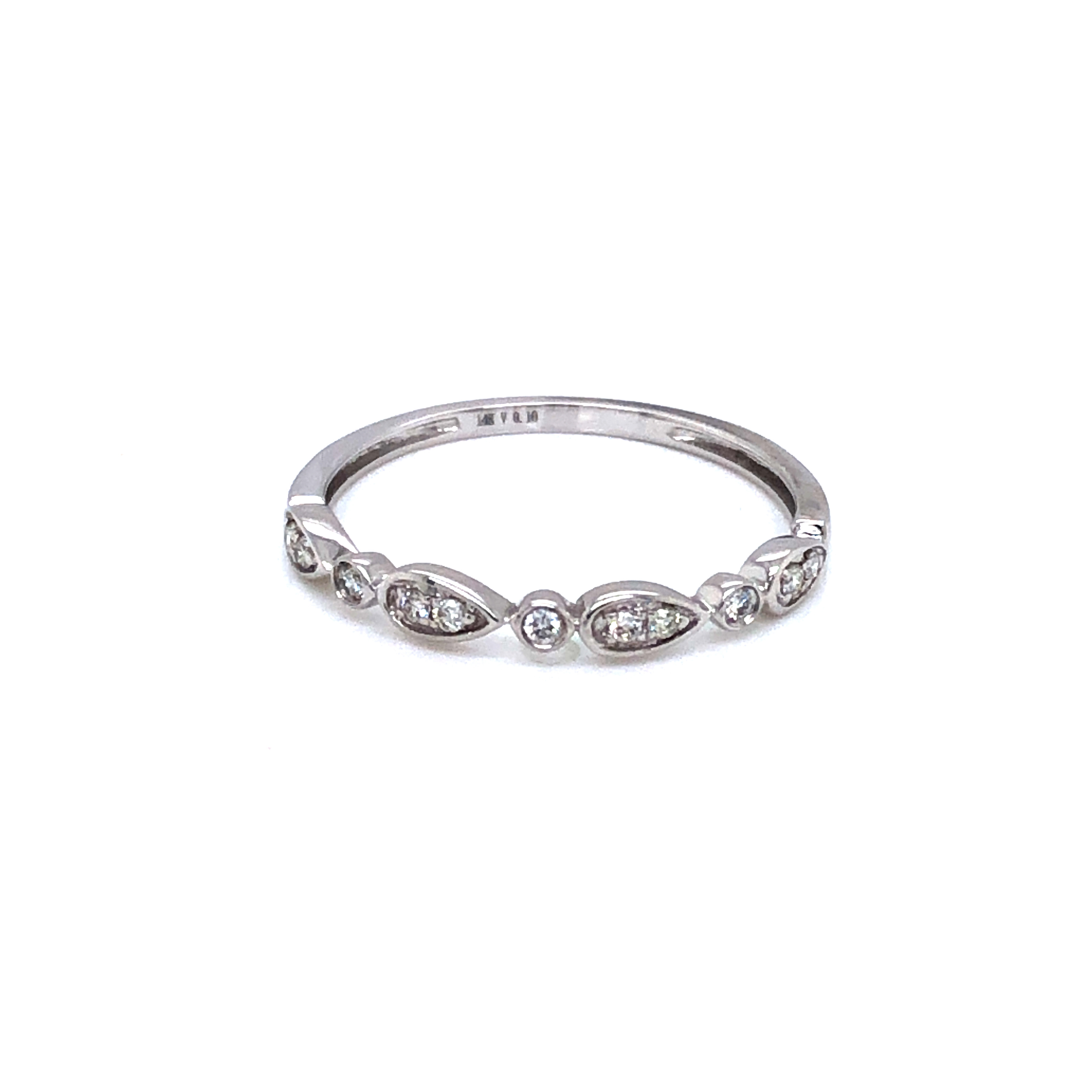 14 karat white gold with 11=0.10 carat total weight G VS Diamond Stackable band