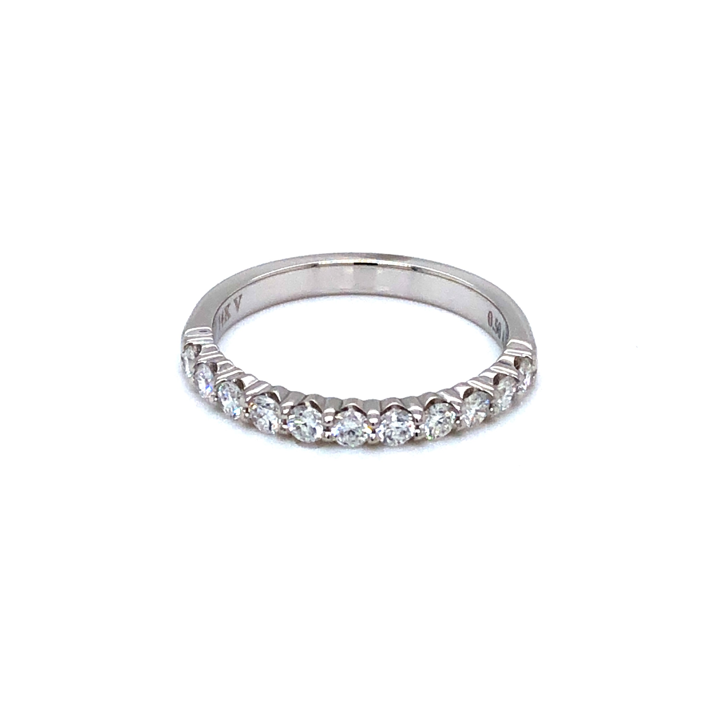 14 karat white gold band with 11=0.50tw round brilliant G VS Diamonds. Size 6.5