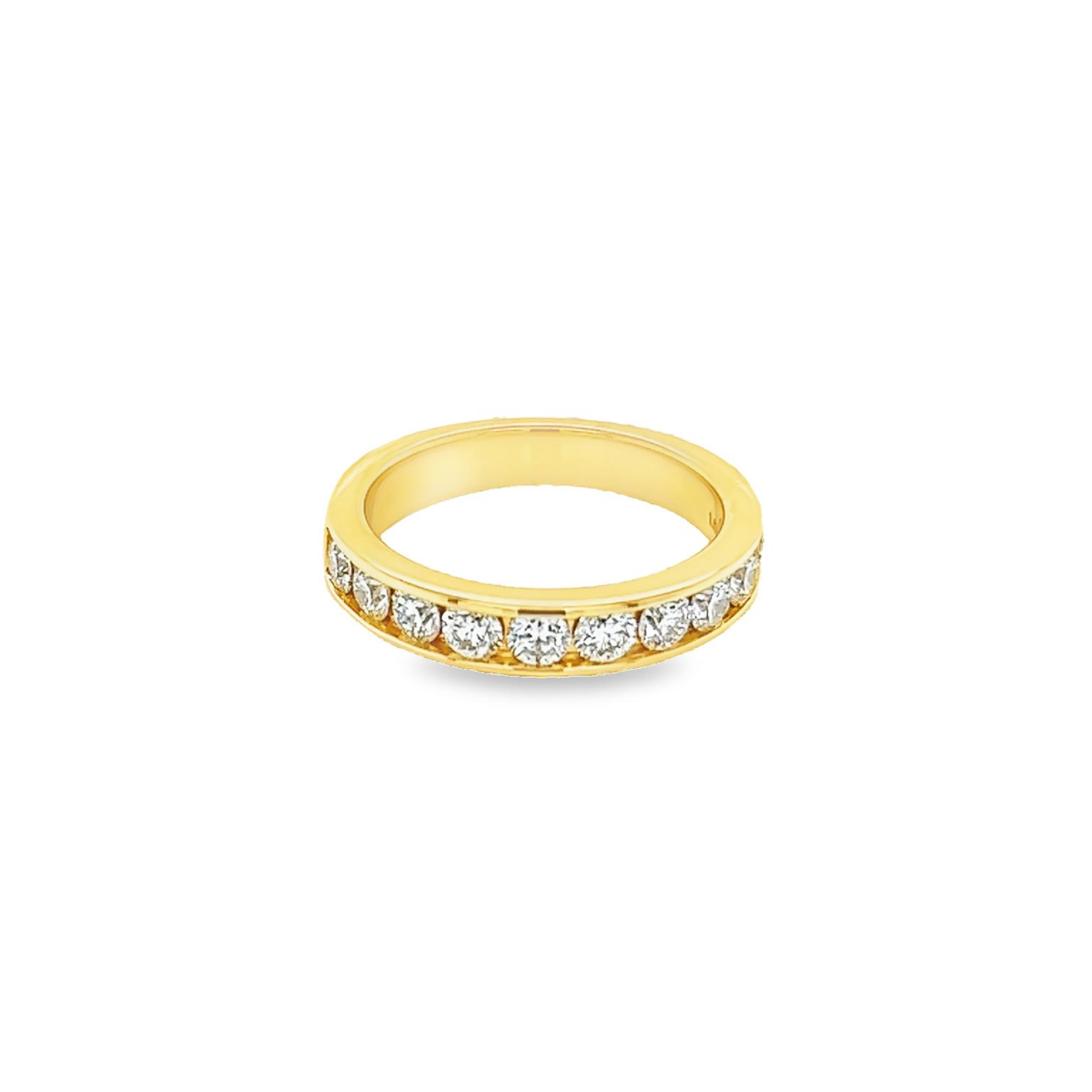 14 Karat yellow gold channel set wedding band Size 6.5 with 10=1.00 total weight round brilliant G VS Diamonds