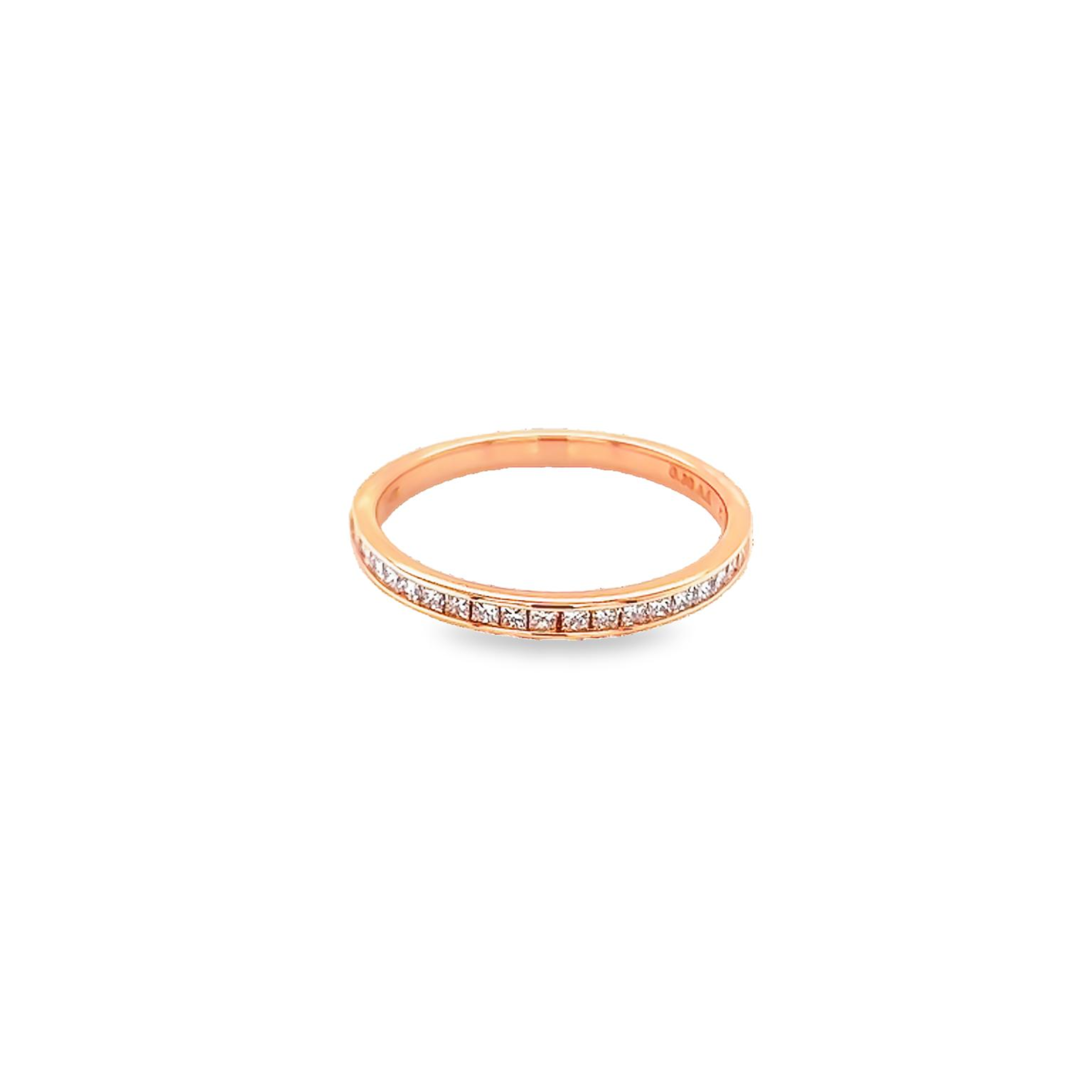 14 Karat rose gold channel set wedding band Size 6.5 with 23=0.30 total weight princess G VS Diamonds