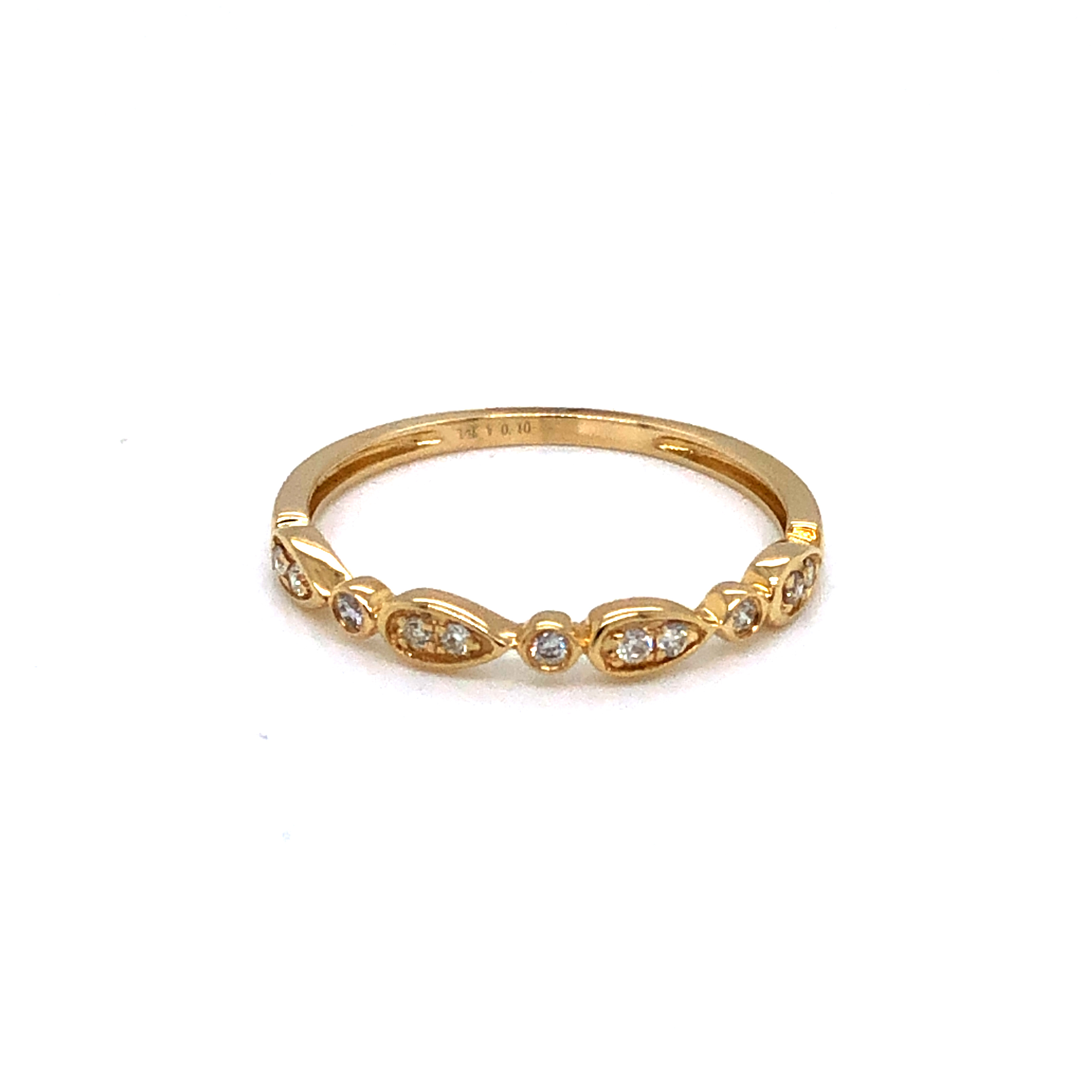 14 karat yellow gold 0.10 carat total weight Diamond Stackable band. Size 6.5